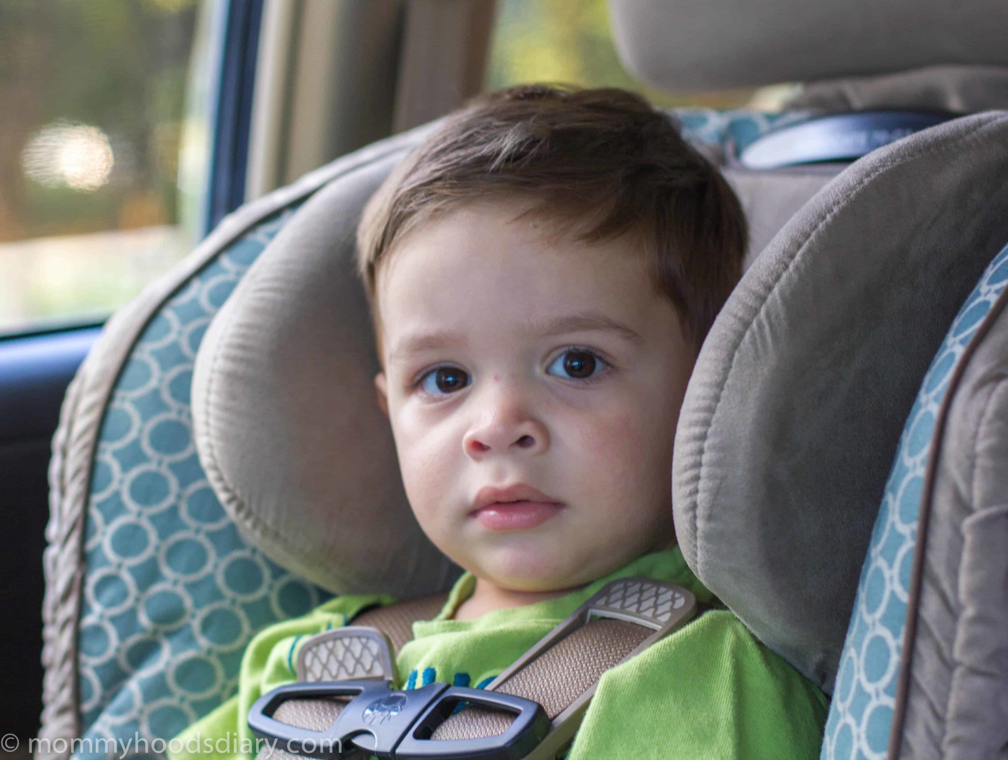 boy in a carseat