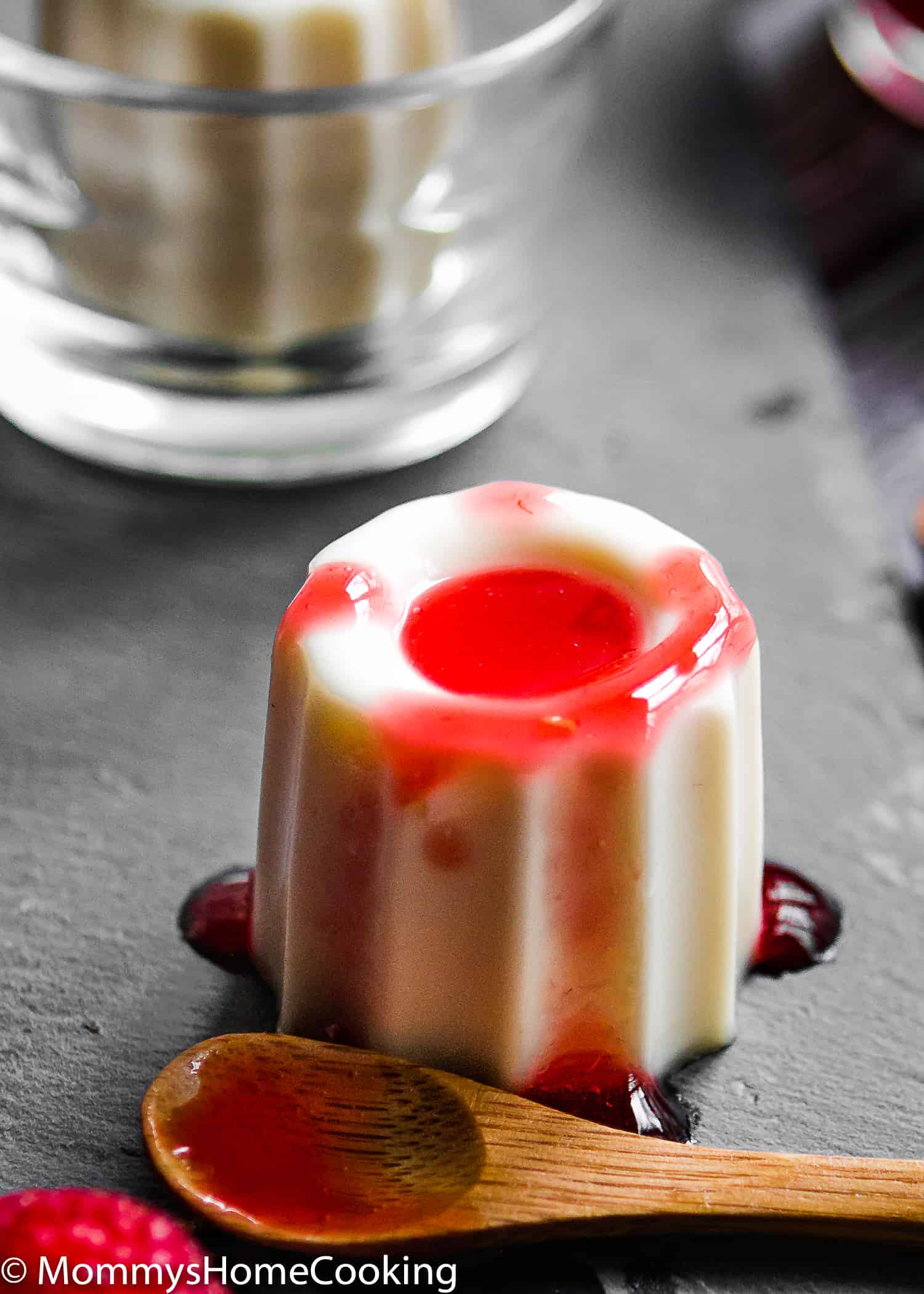 This Panna Cotta with Raspberry Coulis recipe is creamy, rich and silky! This amazingly creamy, melting in the mouth dessert is super easy to make with just 5 ingredients. https://mommyshomecooking.com