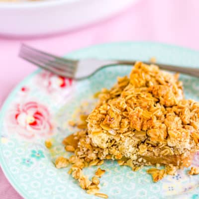 Eggless Apple Crumble with Oats in a blue plate
