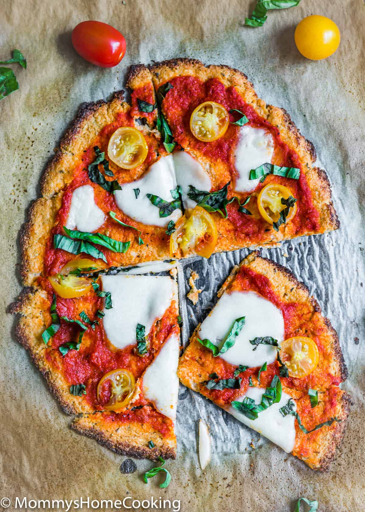 Eggless Cauliflower Pizza cut into slices.