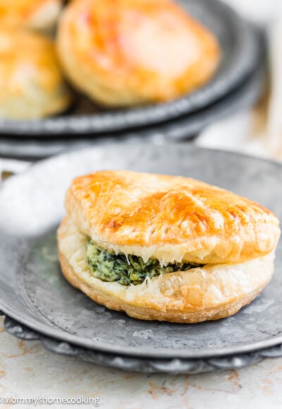 Spinach and Cheese Hand Pie over a metal plate.