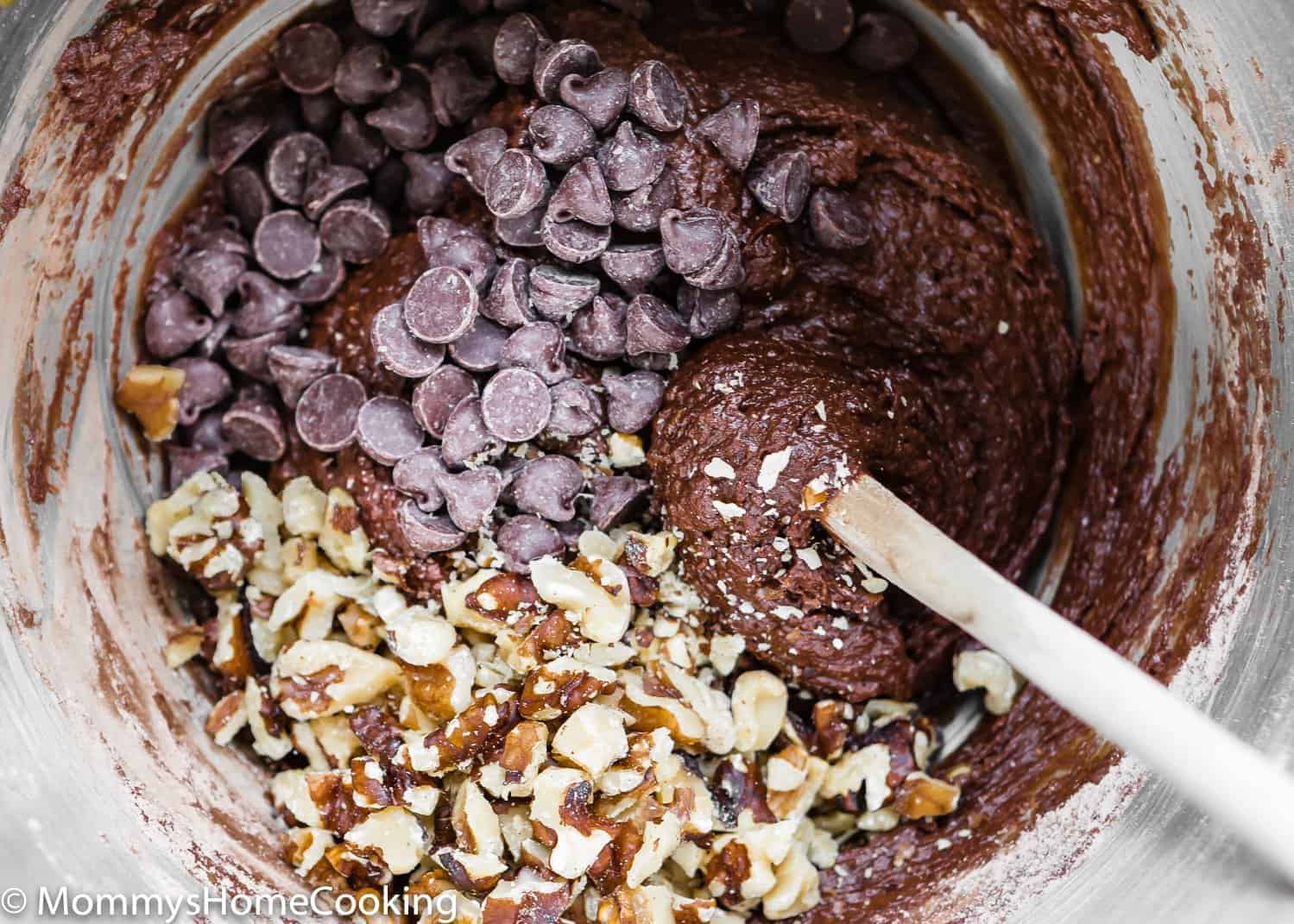 eggless healthy double chocolate  cookies dough in a bowl with a spatula