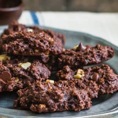 eggless healthy double chocolate chunk walnut cookies on a plate