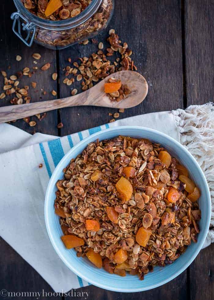 This Coconut Apricot Granola recipe is so easy to make and so delicious that you'll never buy granola again. https://mommyshomecooking.com