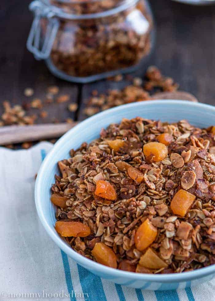 This Coconut Apricot Granola recipe is so easy to make and so delicious that you'll never buy granola again. https://mommyshomecooking.com