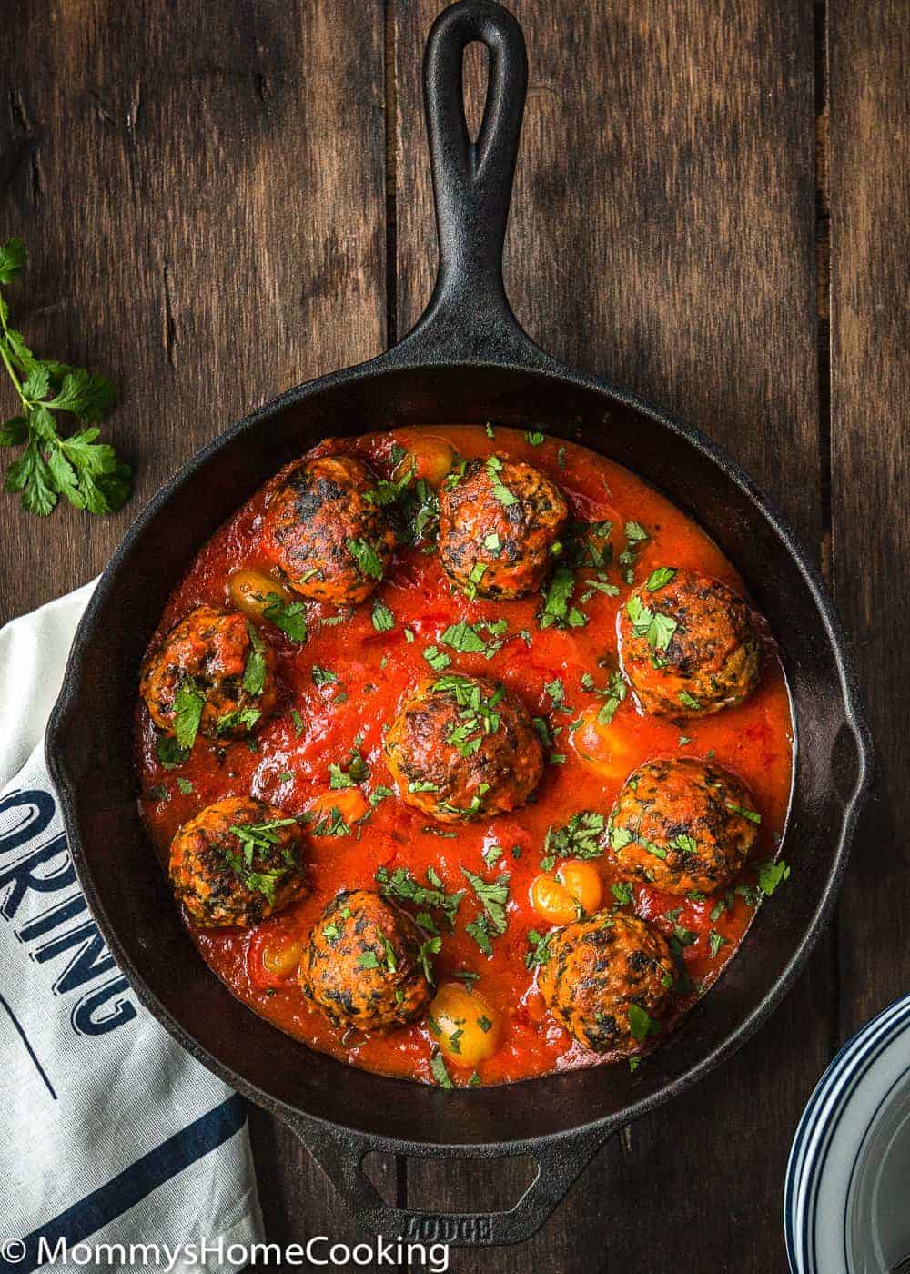 Eggless turkey meat balls in a cast iron skillet.