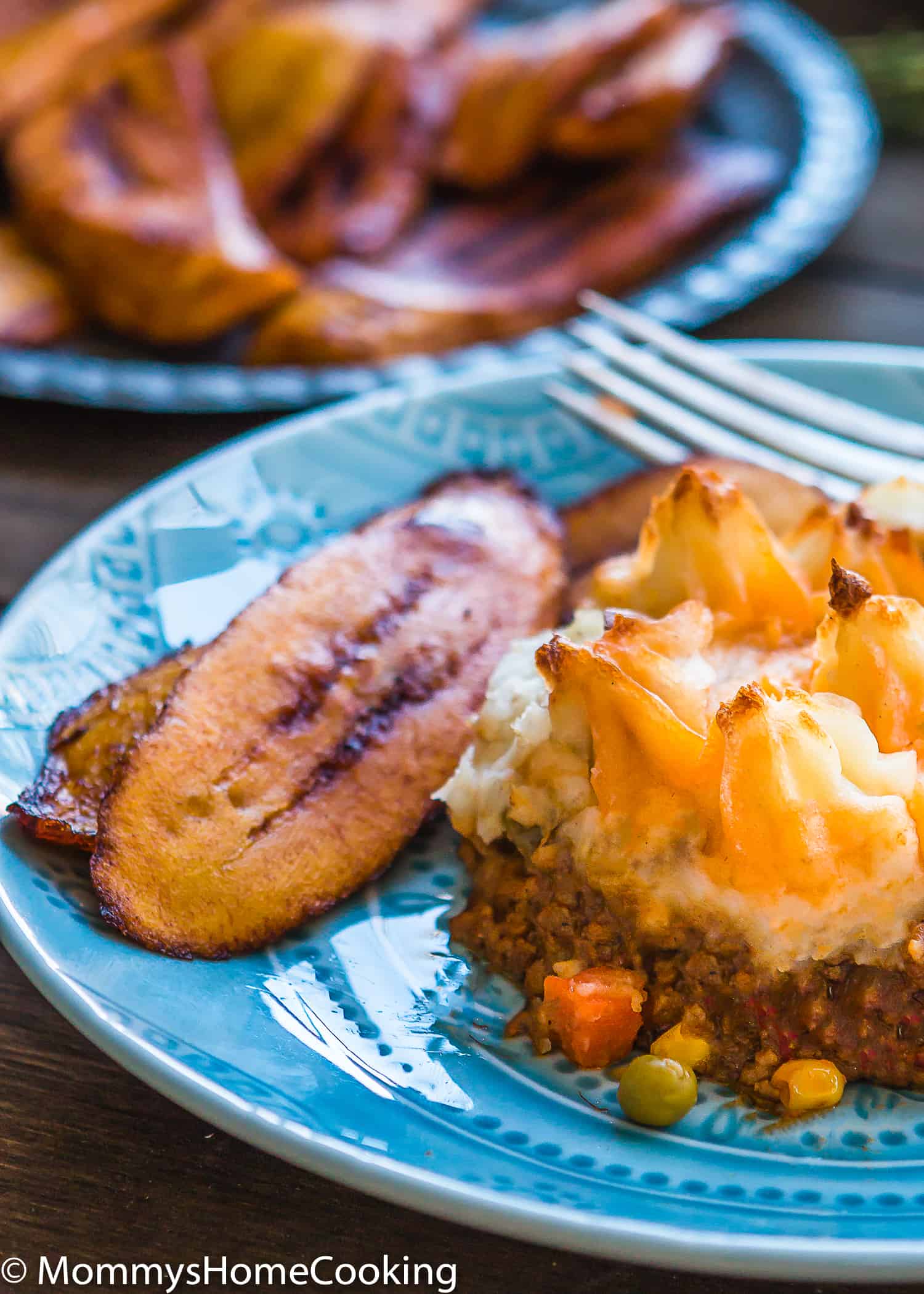 This Easy Shepherd's Pie recipe is a complete, comforting, and scrumptious meal full of flavor! Made from scratch with Parmesan mashed potatoes and baked to perfection. https://mommyshomecooking.com