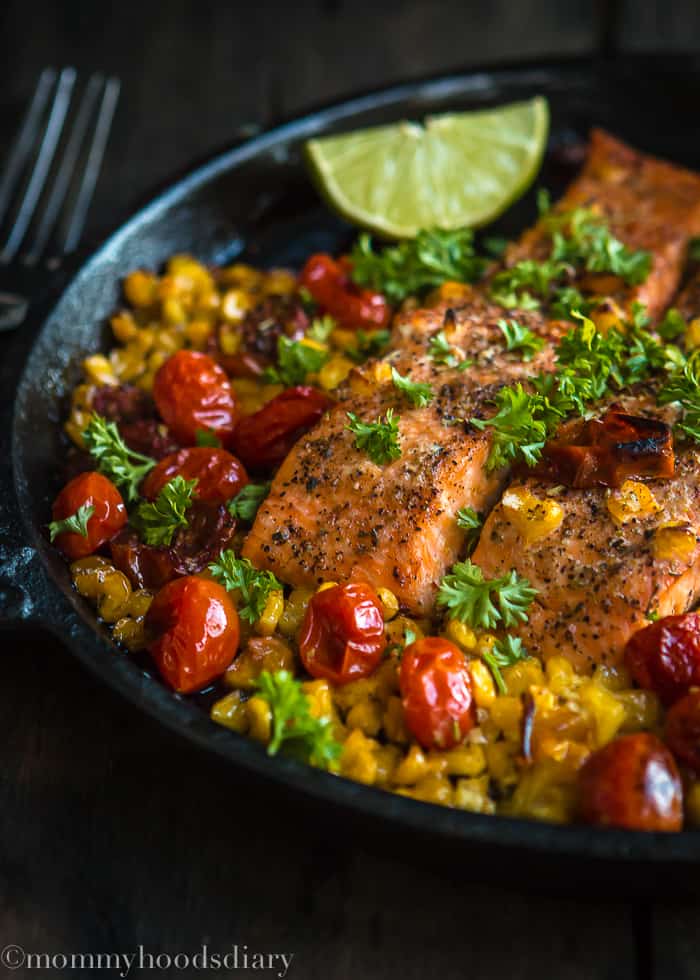 Salmon with Roasted Tomatoes and Corn-Salmon with Roasted Tomatoes and Corn is an effortless dinner that the whole family will love! Picky eaters approved. https://mommyshomecooking.com