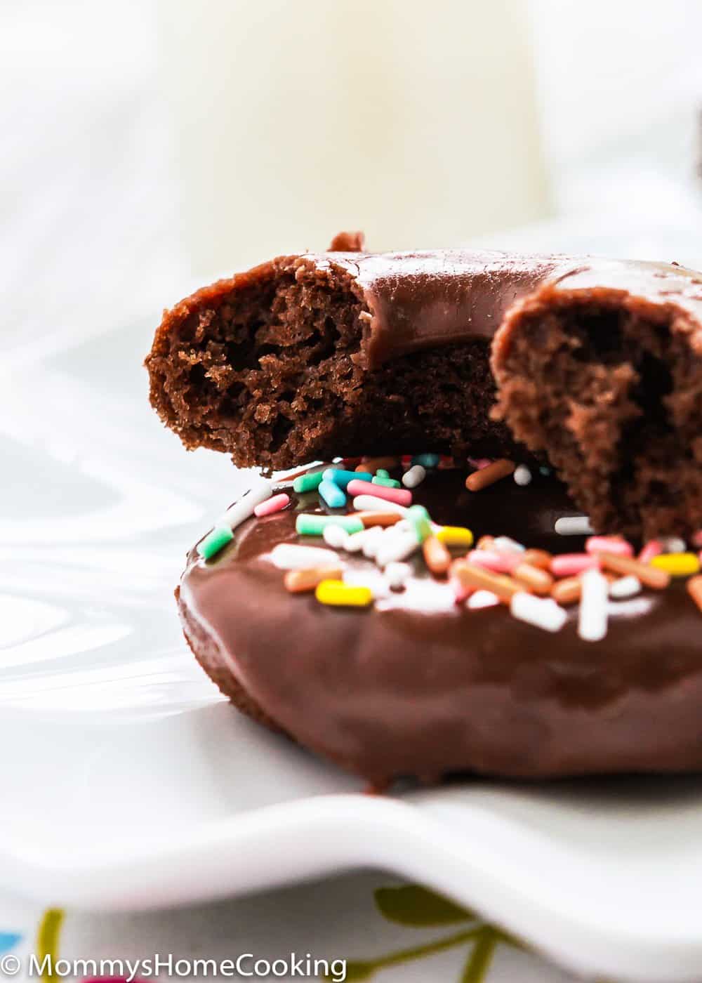 Easy Eggless Chocolate Donuts with chocolate glaze bitten 