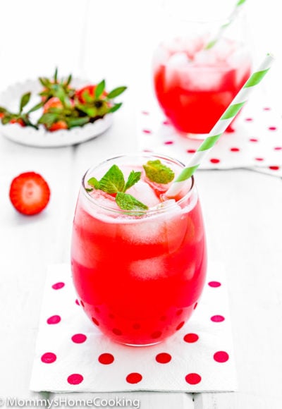 homemade Strawberry lemonade in a glass with a straw