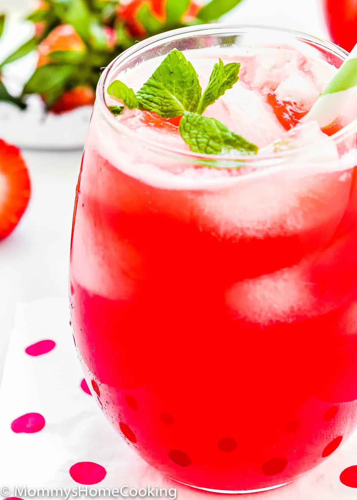 closeup view of a glass full of homemade Strawberry lemonade