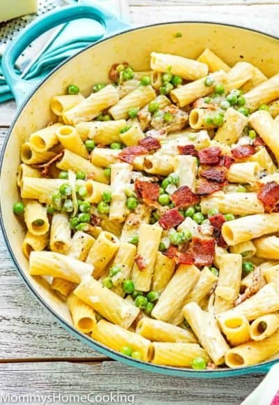 Easy Creamy Alfredo Pasta with Bacon and Peas in a pot