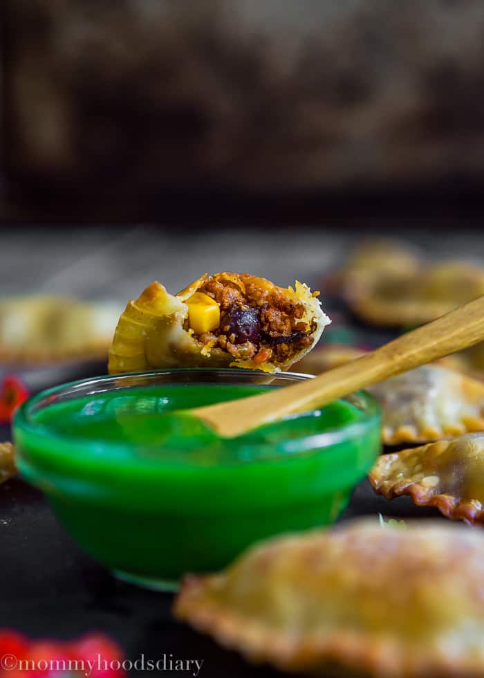 Mini Spicy Pork Chorizo Empanadas bitten