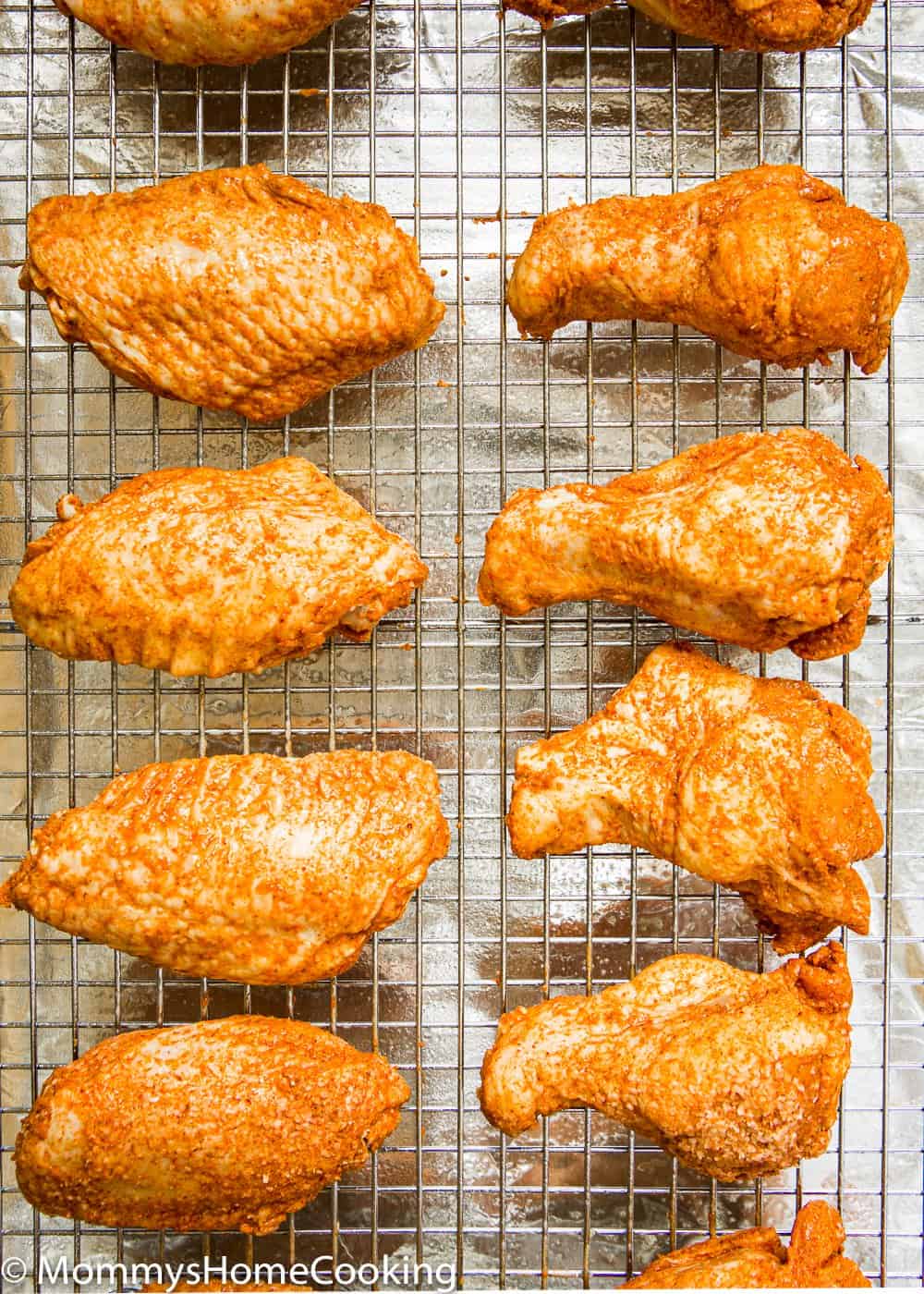 chicken wings in a baking sheet