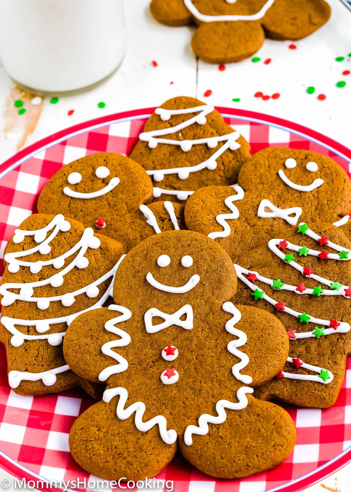 Eggless Gingerbread Cookies over a Christmas plate.