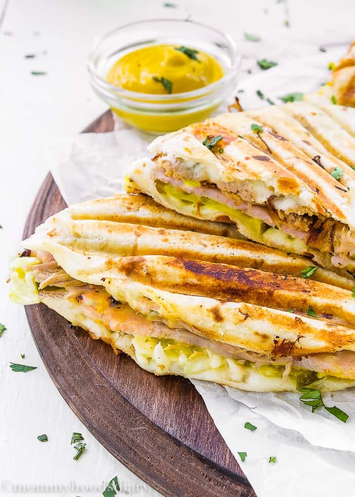 These Cuban Quesadillas are ridiculously easy to make, delicious, and bursting with flavor!  Perfect for an easy, NO-FUSS meal. https://mommyshomecooking.com