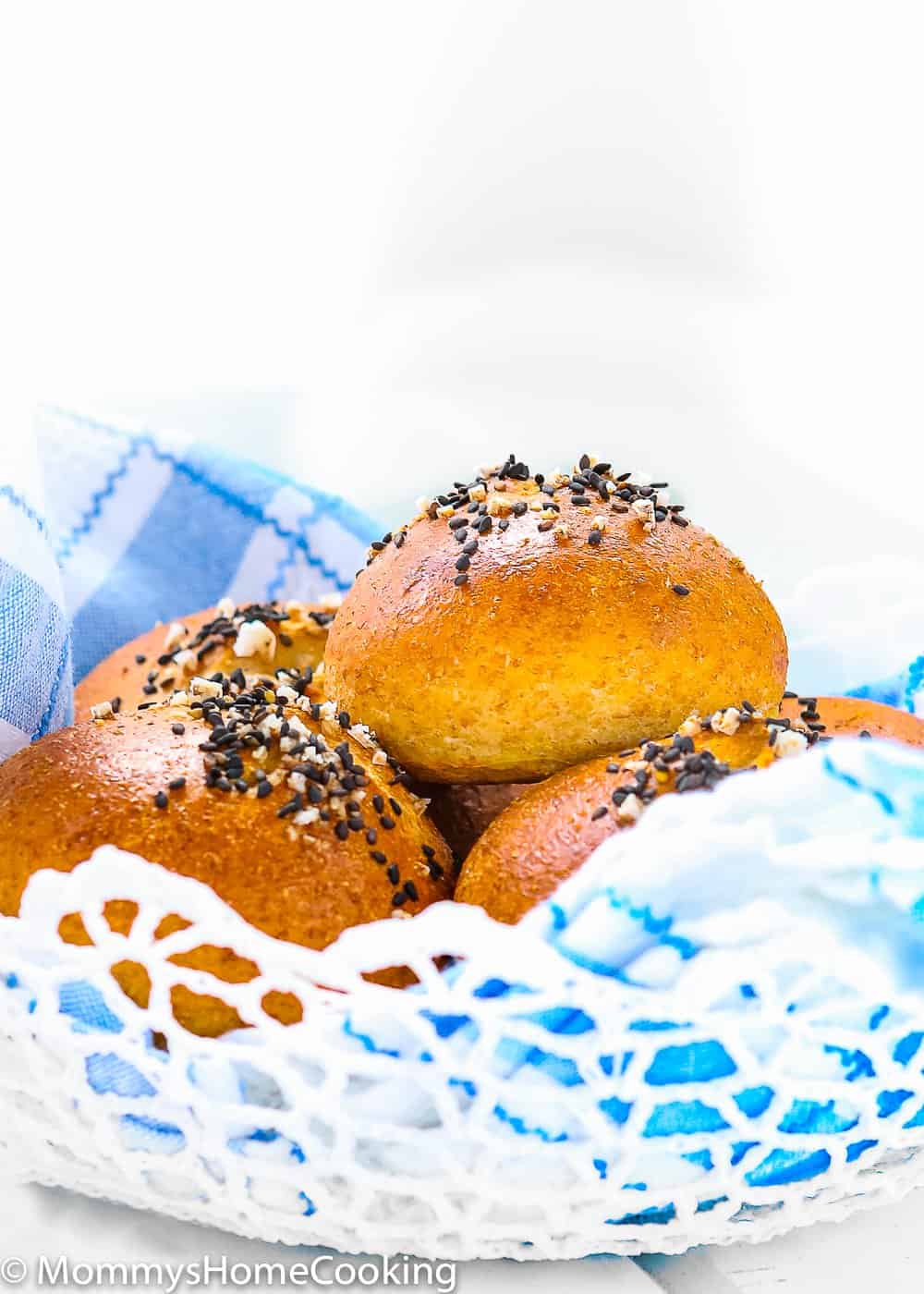Soft Eggless Honey Whole Wheat Rolls in a bread basket