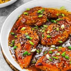 Easy Asian-Style Chicken Breasts in a white skillet