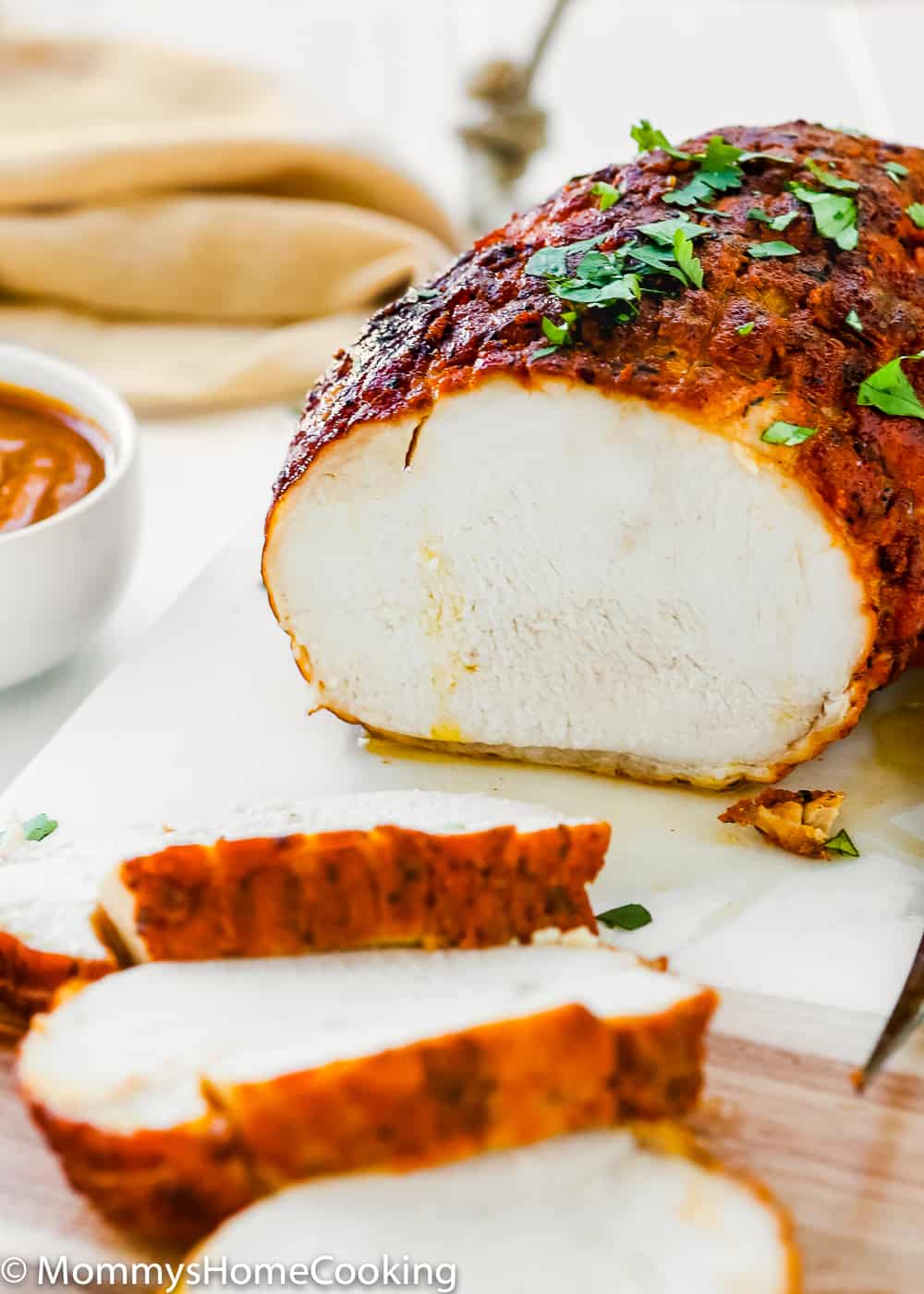 Chipotle Turkey Breast Roast  over a cutting board