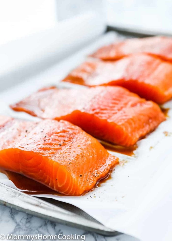 raw salmon in a baking sheet