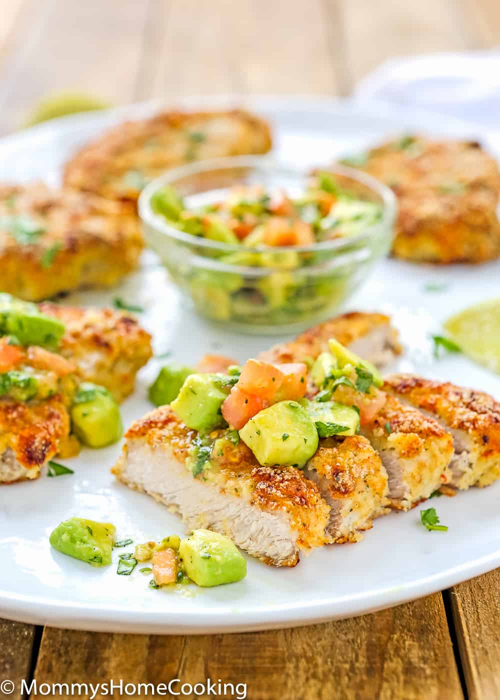 These Low Carb Breadless Skinny Oven Fried Pork Chops are super easy to make and beyond flavorful. It comes together in about 30 minutes, making it a great, and healthy, weeknight dinner. https://mommyshomecooking.com