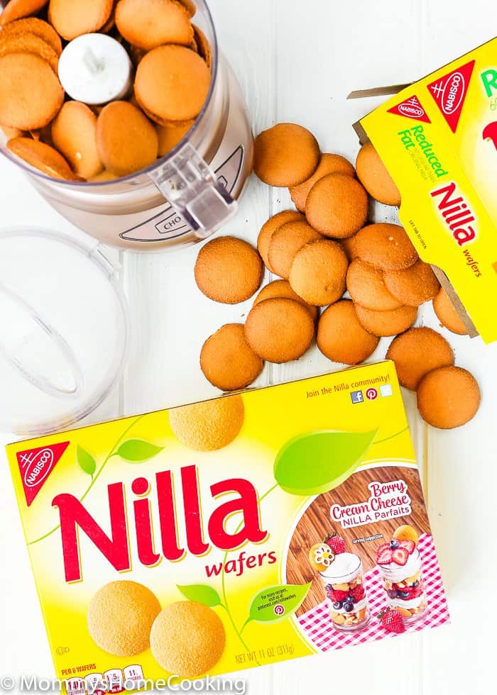 Box of Nilla wafers and wafers inside of a food processor.