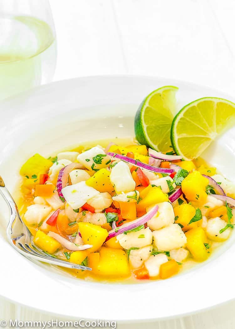 This Easy Fish and Mango Ceviche is the most addictive yet healthy dish that was ever born! It’s tangy, savory, zesty, and sweet, perfect for summer gatherings. Ready in about 20 minutes. https://mommyshomecooking.com