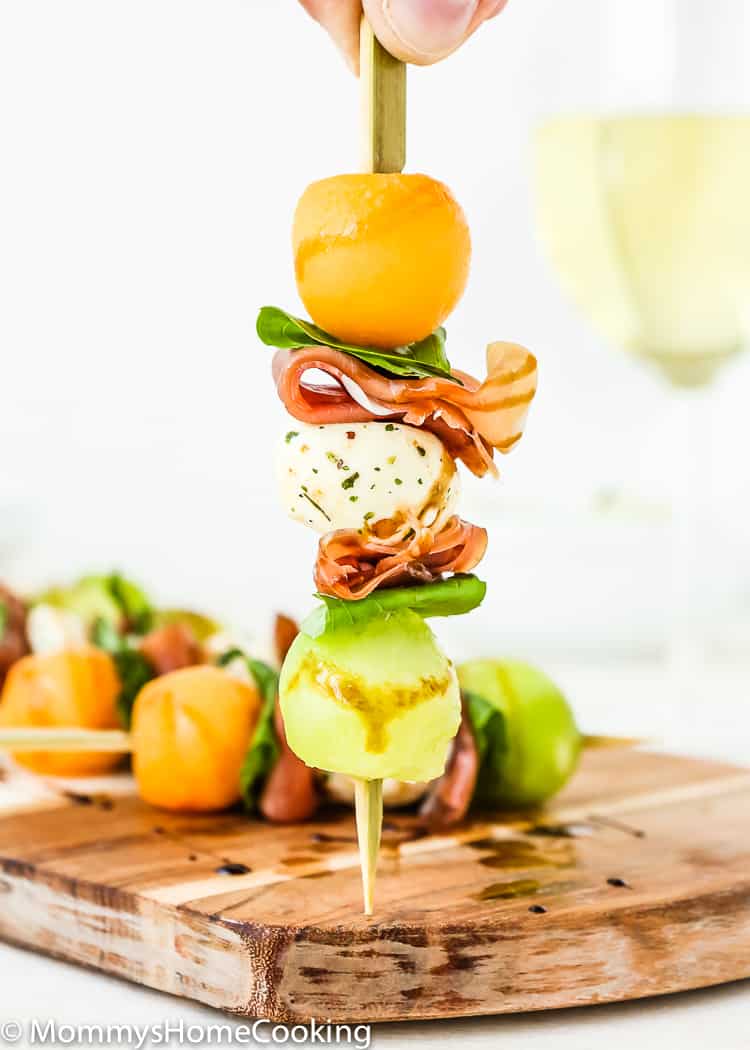 These Prosciutto Melon Skewers are sweet, salty, and tangy all in one. They come together in minutes and are delish. Perfect appetizer recipe for an al fresco summer gathering! https://mommyshomecooking.com