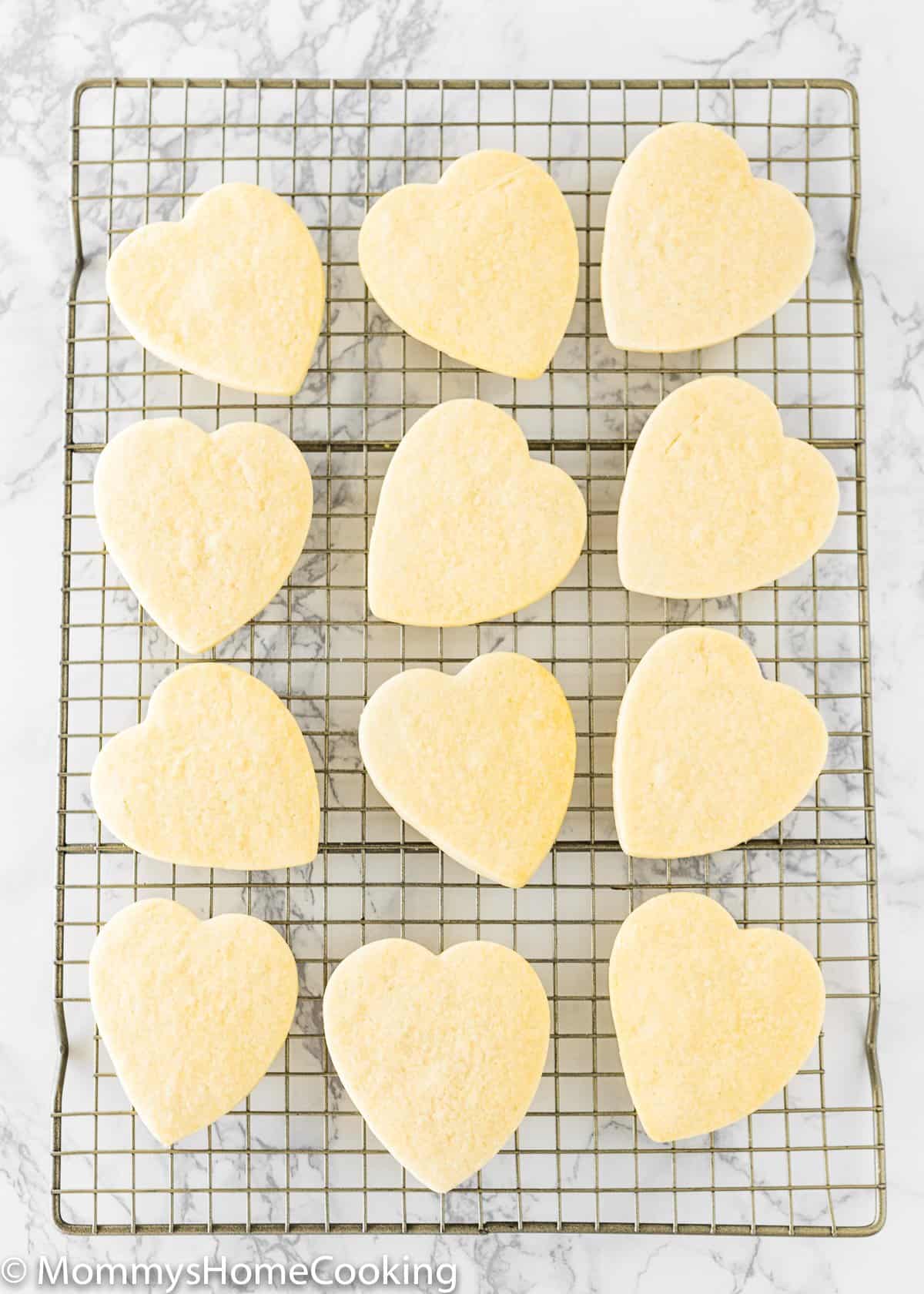 overhead view of egg-free sugar cookies over a cooling rack