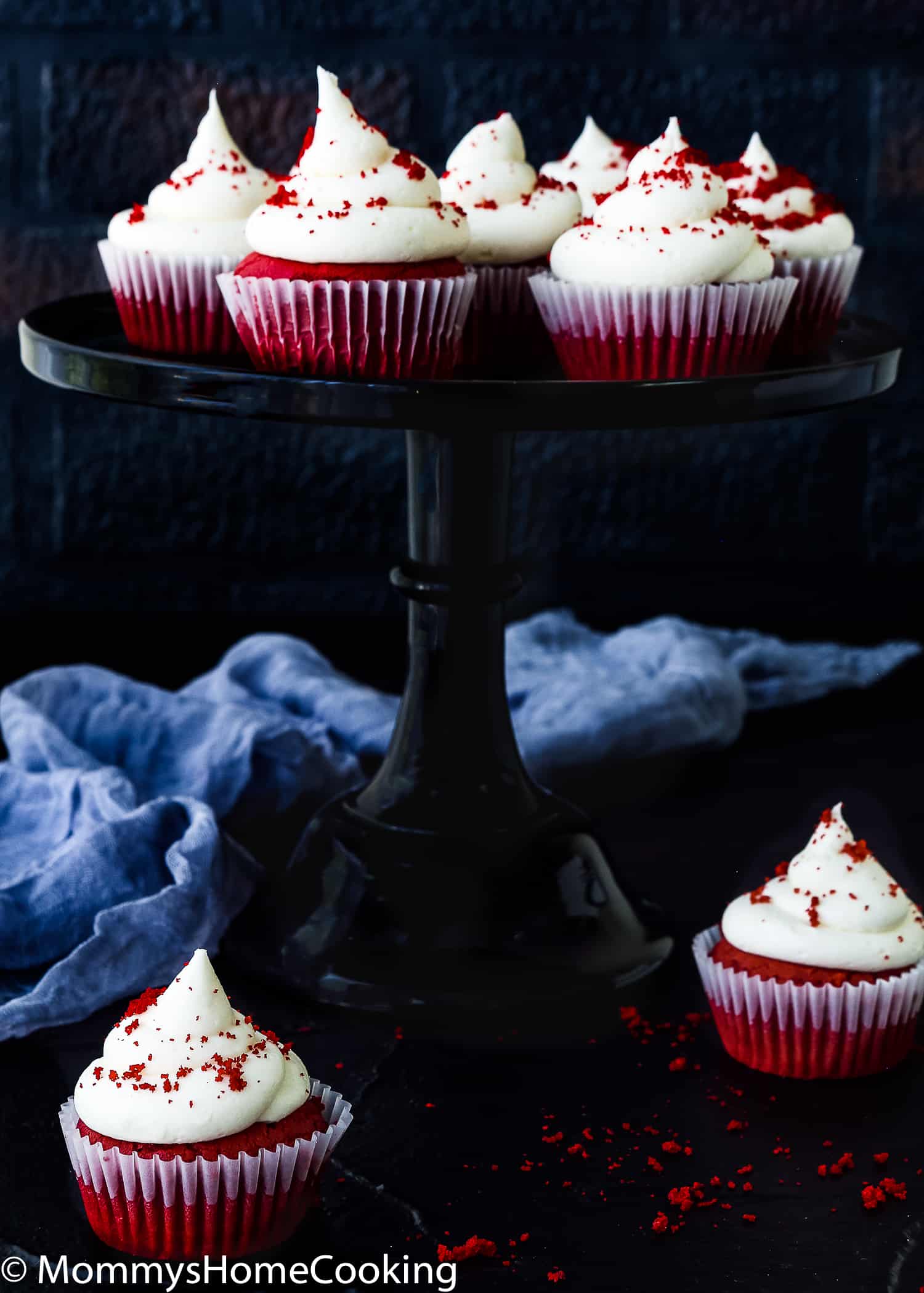 Eggless Red Velvet Cupcakes on a cake stand.