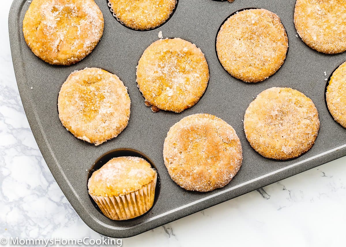 overhead view of Eggless Sugar Donut Muffins in a muffin tin