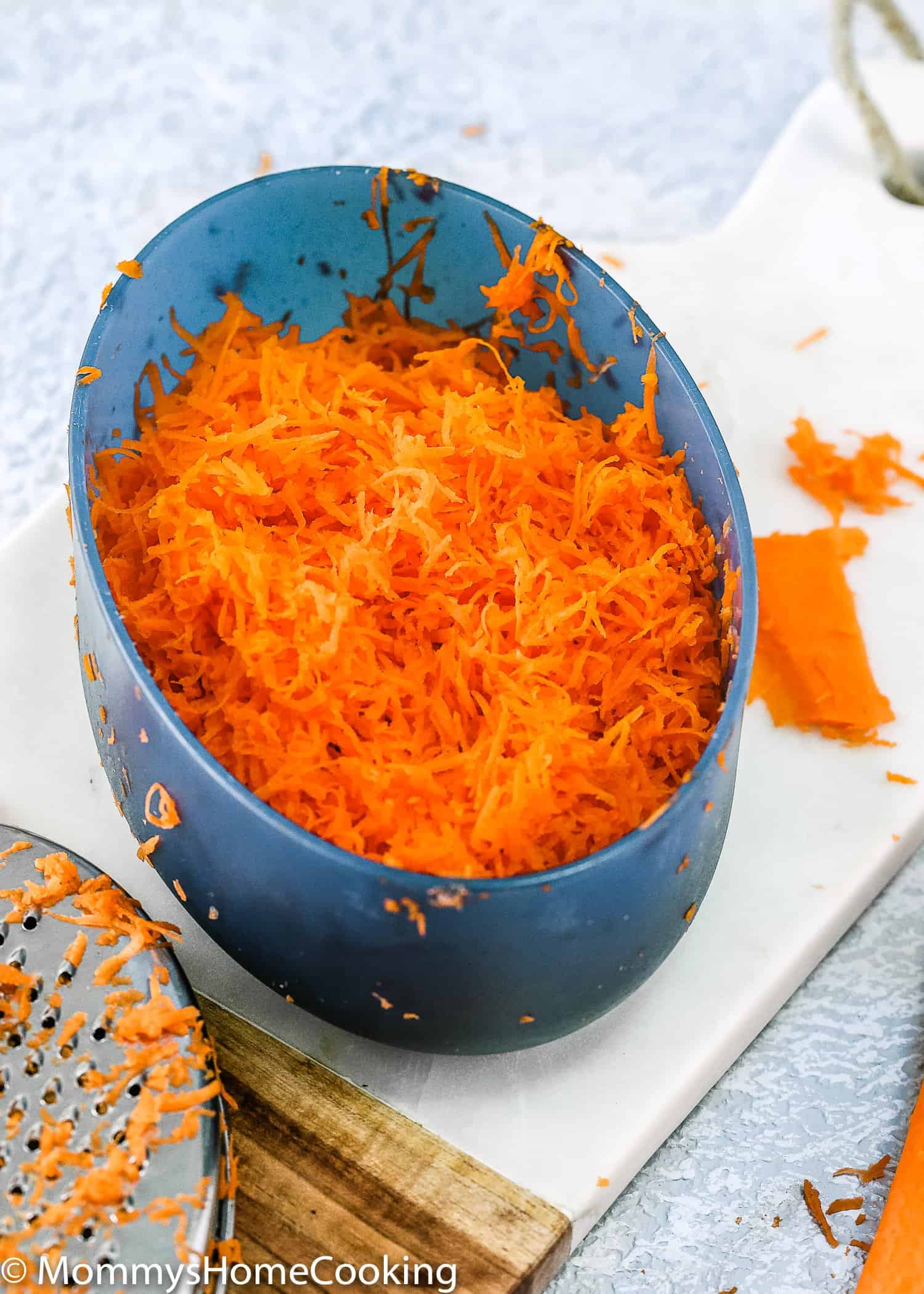 grated carrots in a container 