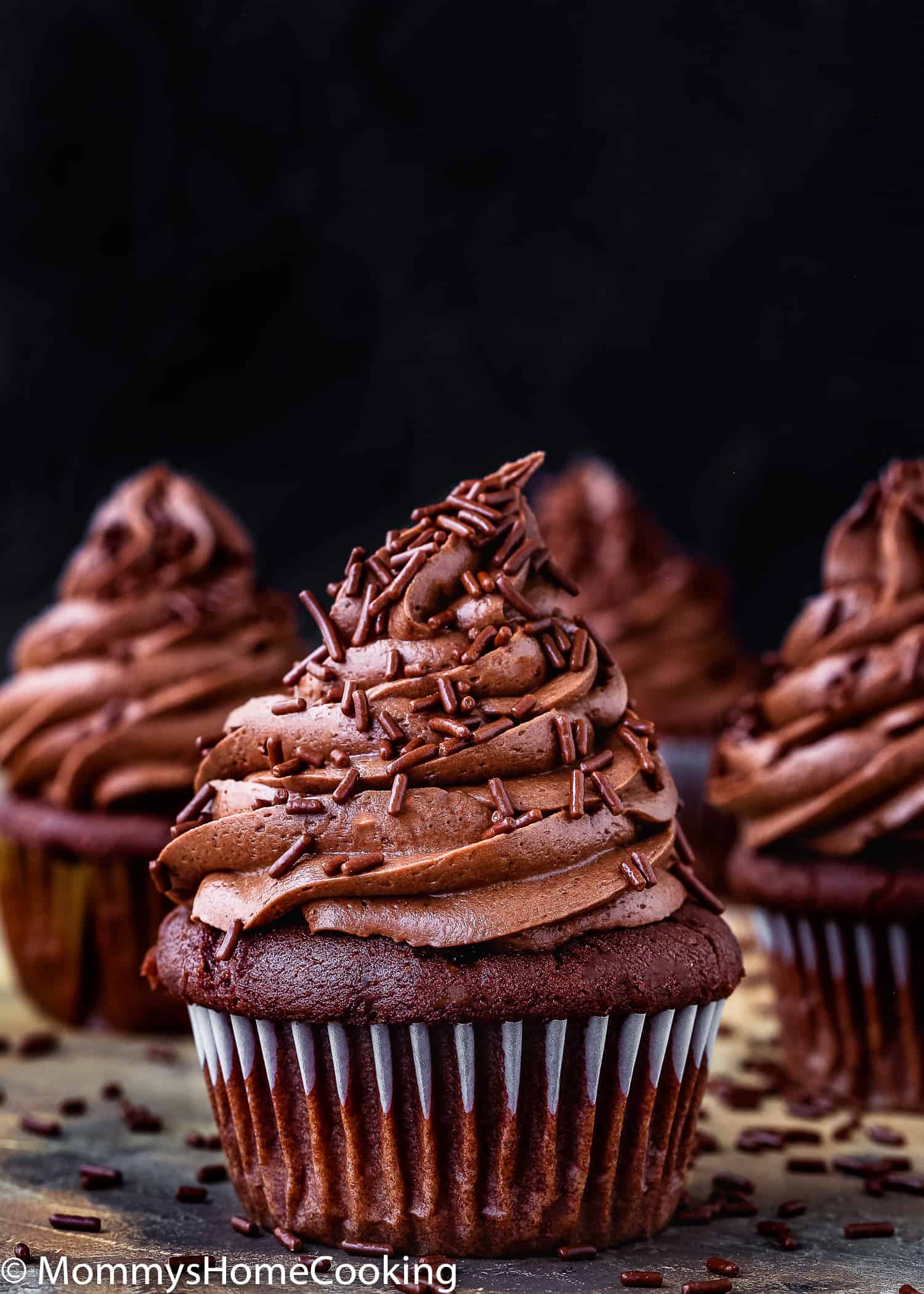 Moist Eggless Chocolate Cupcakes with chocolate frosting.