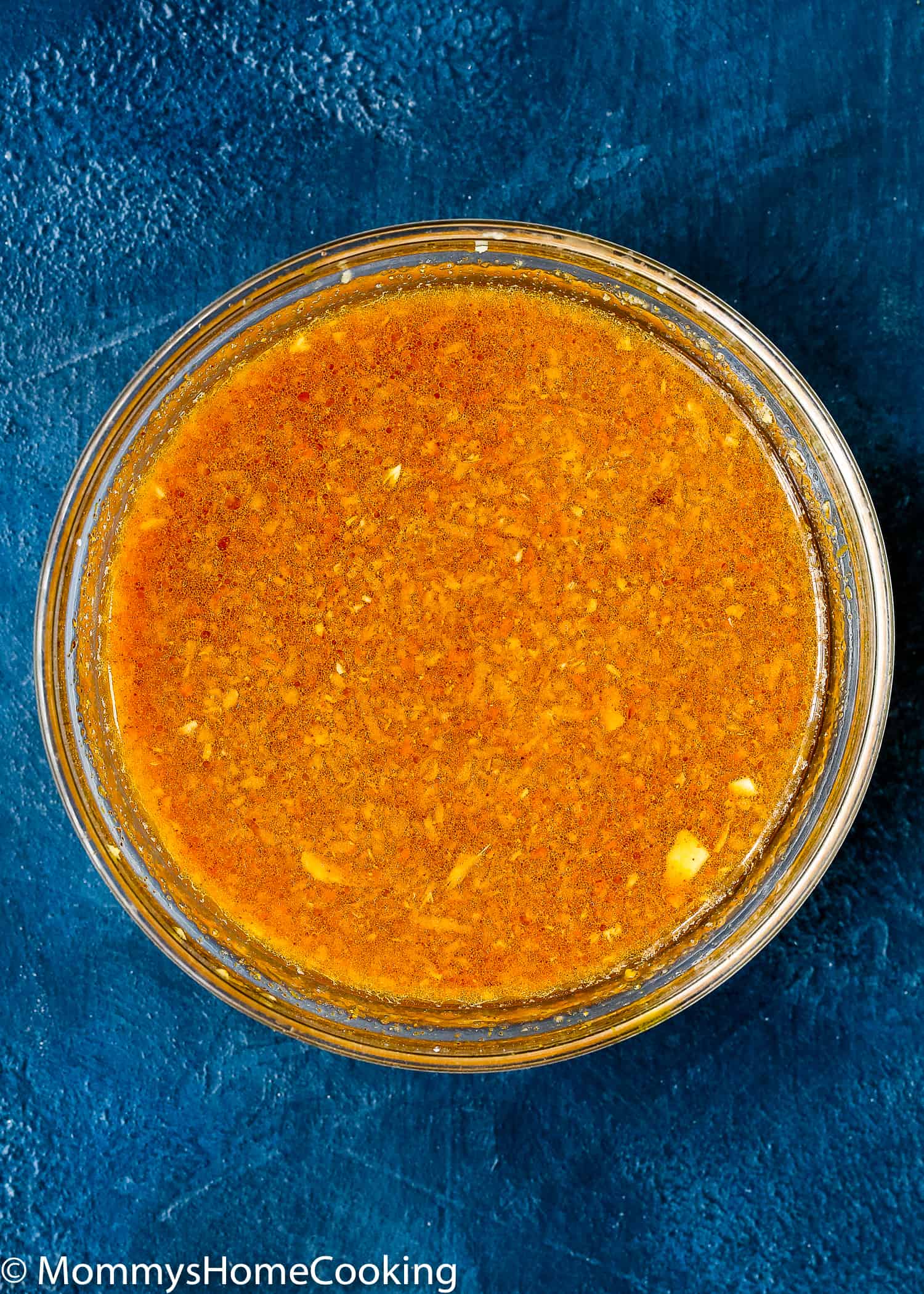 sauce to make orange chicken in a bowl