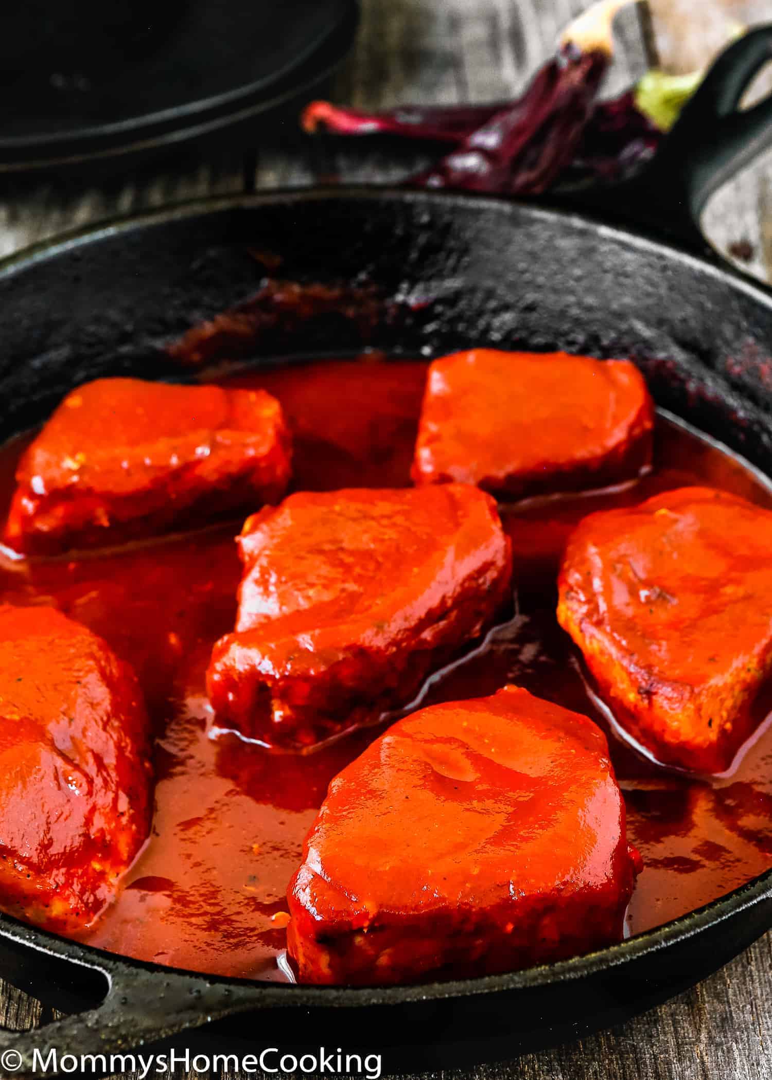 Mexican Pork Tenderloin Adobo in a cast iron skillet. 