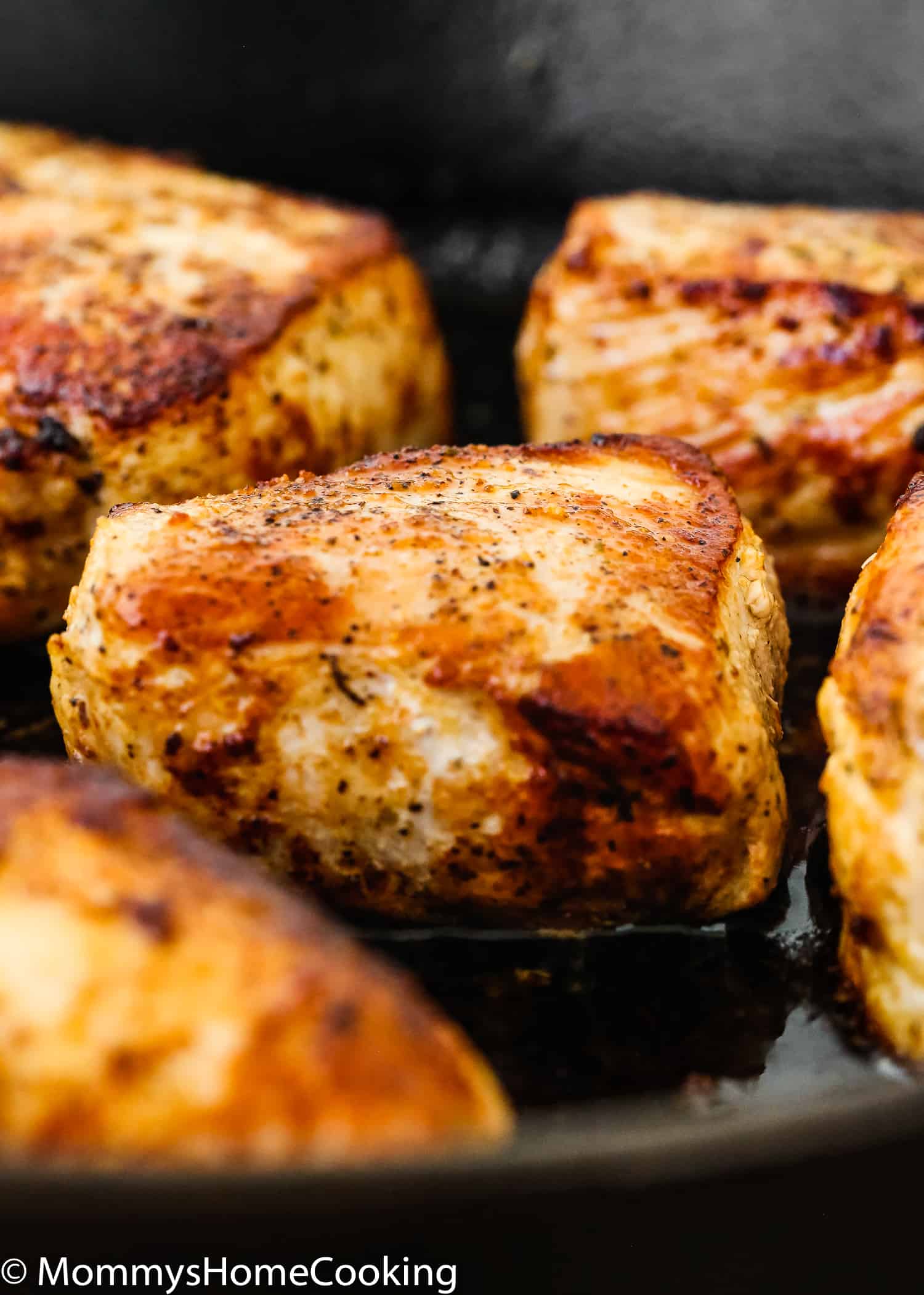 browned pork in a skillet.