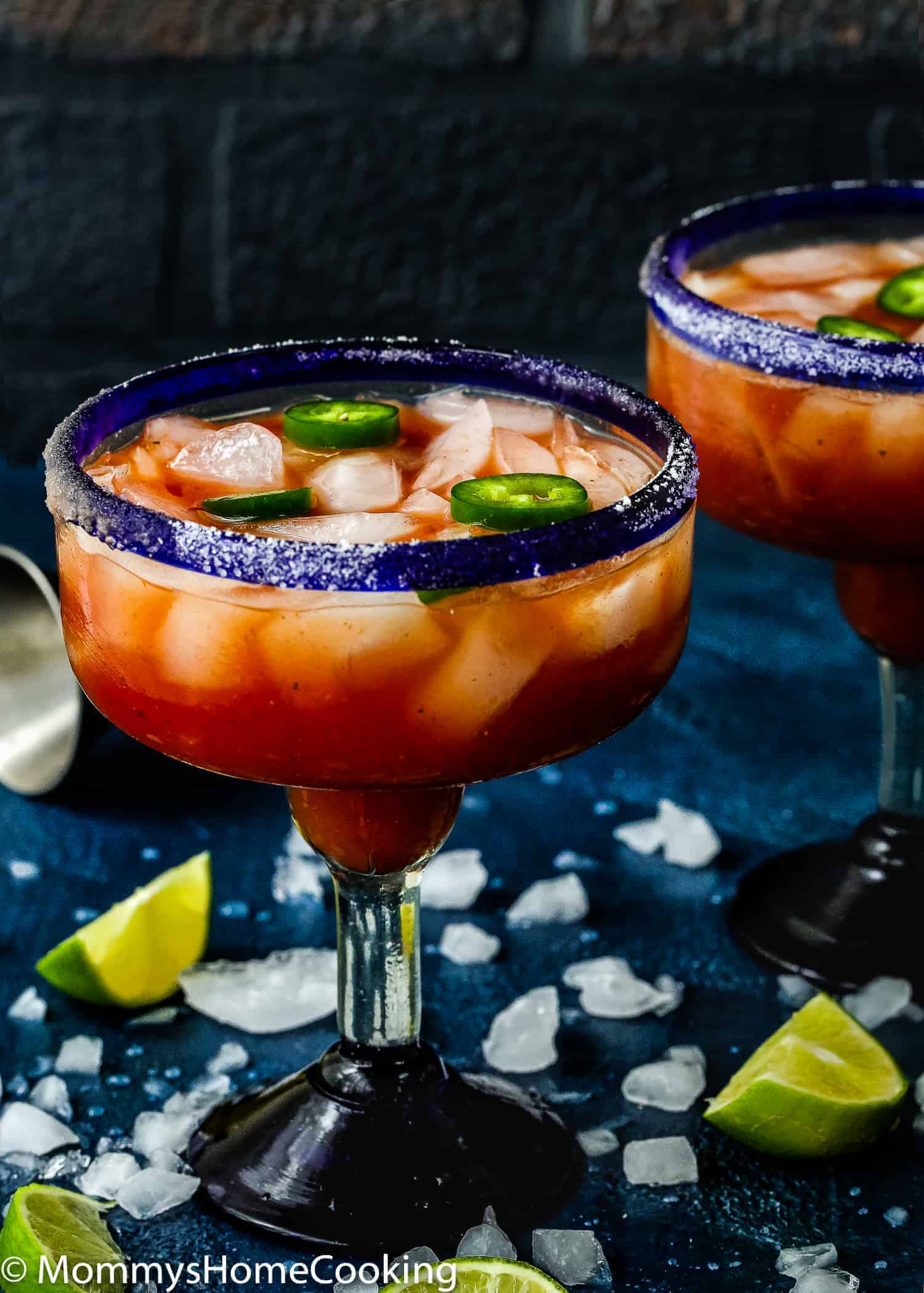 This Spicy Salsa Margarita is boozy, refreshing, citrusy and totally irresistible! This cocktail taste like the perfect combination of a bloody mary and a margarita, all in one sip. Made with fresh salsa, tequila, agave and lime, this delicious and different cocktail will knock your guests' socks off! https://mommyshomecooking.com