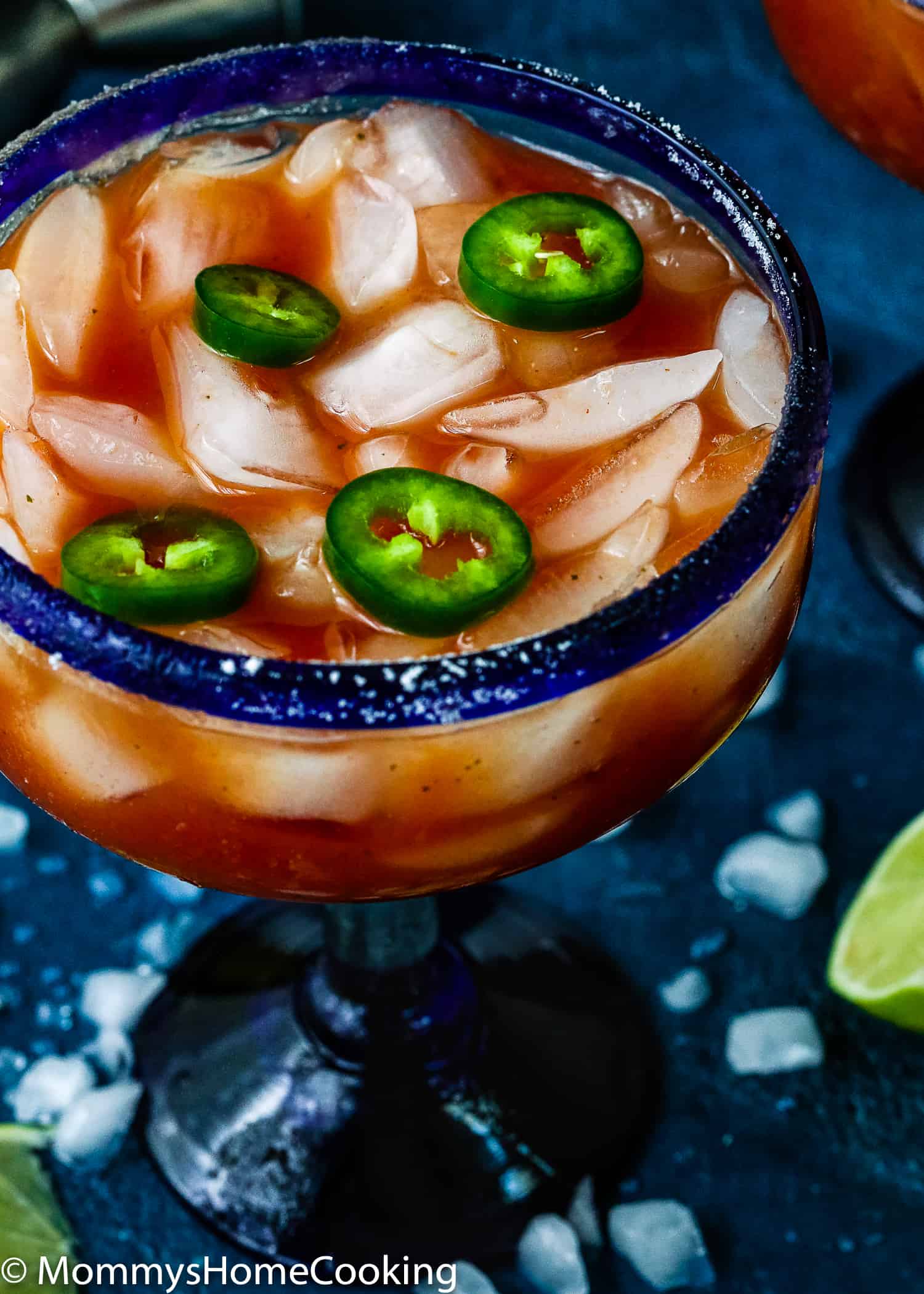 This Spicy Salsa Margarita is boozy, refreshing, citrusy and totally irresistible! This cocktail taste like the perfect combination of a bloody mary and a margarita, all in one sip. Made with fresh salsa, tequila, agave and lime, this delicious and different cocktail will knock your guests' socks off! https://mommyshomecooking.com