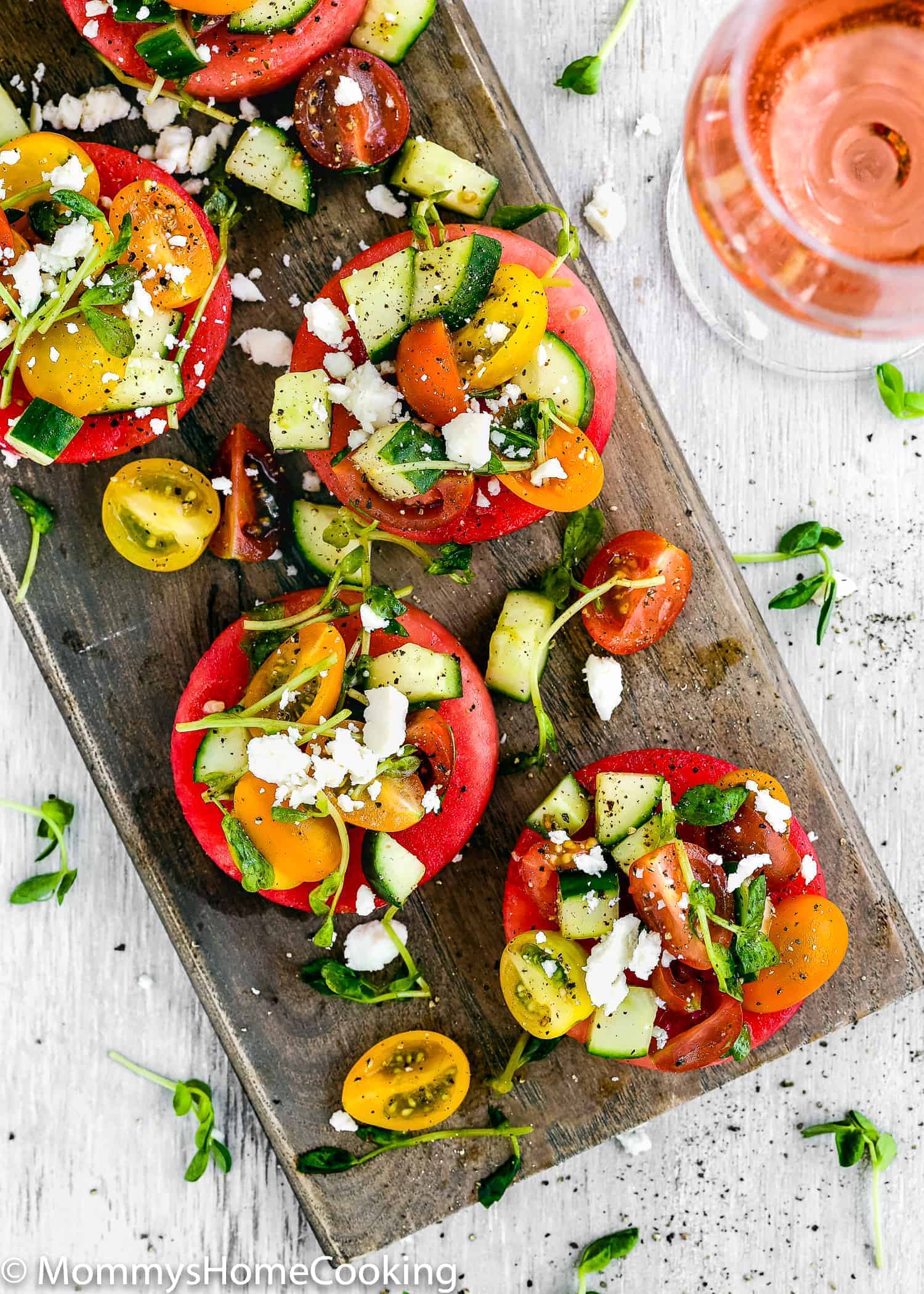 This Low-Carb Watermelon Bruschetta is sweet, savory, fruity, salty, zesty and totally delicious! All you need are a few ingredients and 15 minutes, or less, of chopping. Perfect idea for a super fun Girls Night In, for potlucks, or brunch, lunch, or dinners. Pair it with a glass of rosé for an unforgettable bite. https://mommyshomeccoking.com