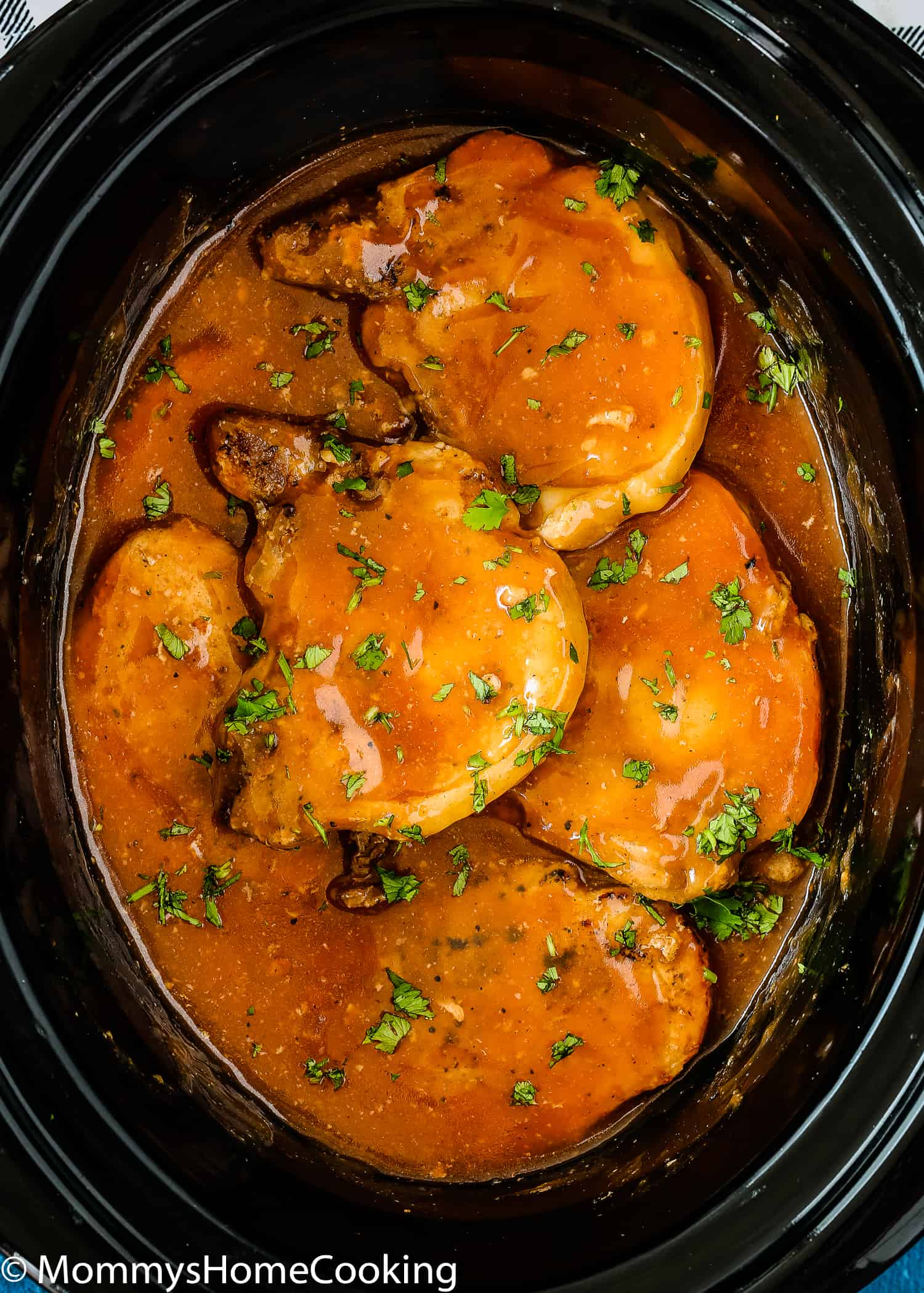 These Slow Cooker Beer Pork Chops are spectacularly delicious! This recipe results in tender, flavor-packed pork chops that taste like a million bucks. You can make this tonight with any pork chops or even CHICKEN! https://mommyshomecooking.com