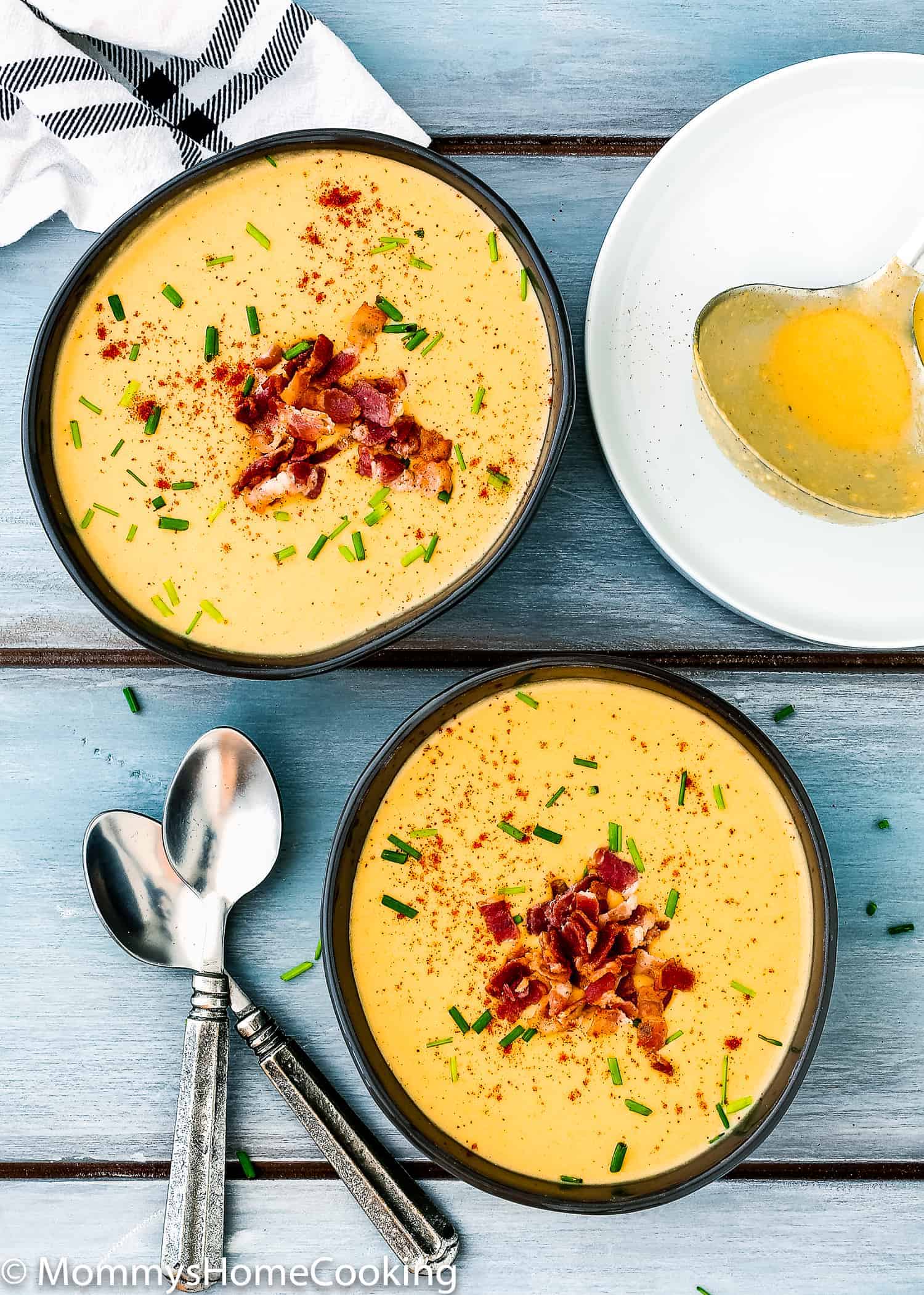 two bowls with Smoky Cheese and Potato Soup 