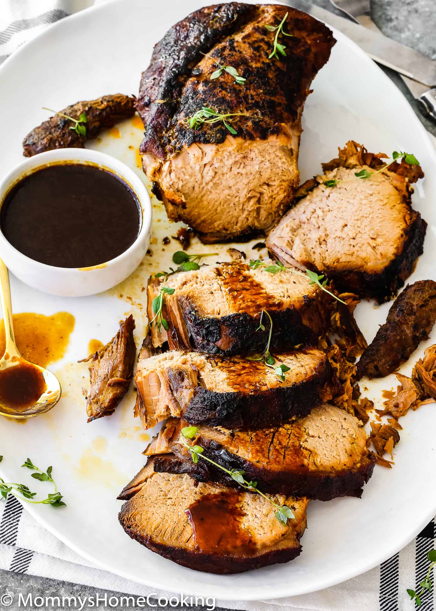 This Slow Cooker Honey Balsamic Pork Loin is tender, juicy and fall-apart delicious! Smothered in a rich honey balsamic sauce, this pork loin is easy for weeknight dinner yet fancy, elegant and impressive enough for company. https://mommyshomecooking.com