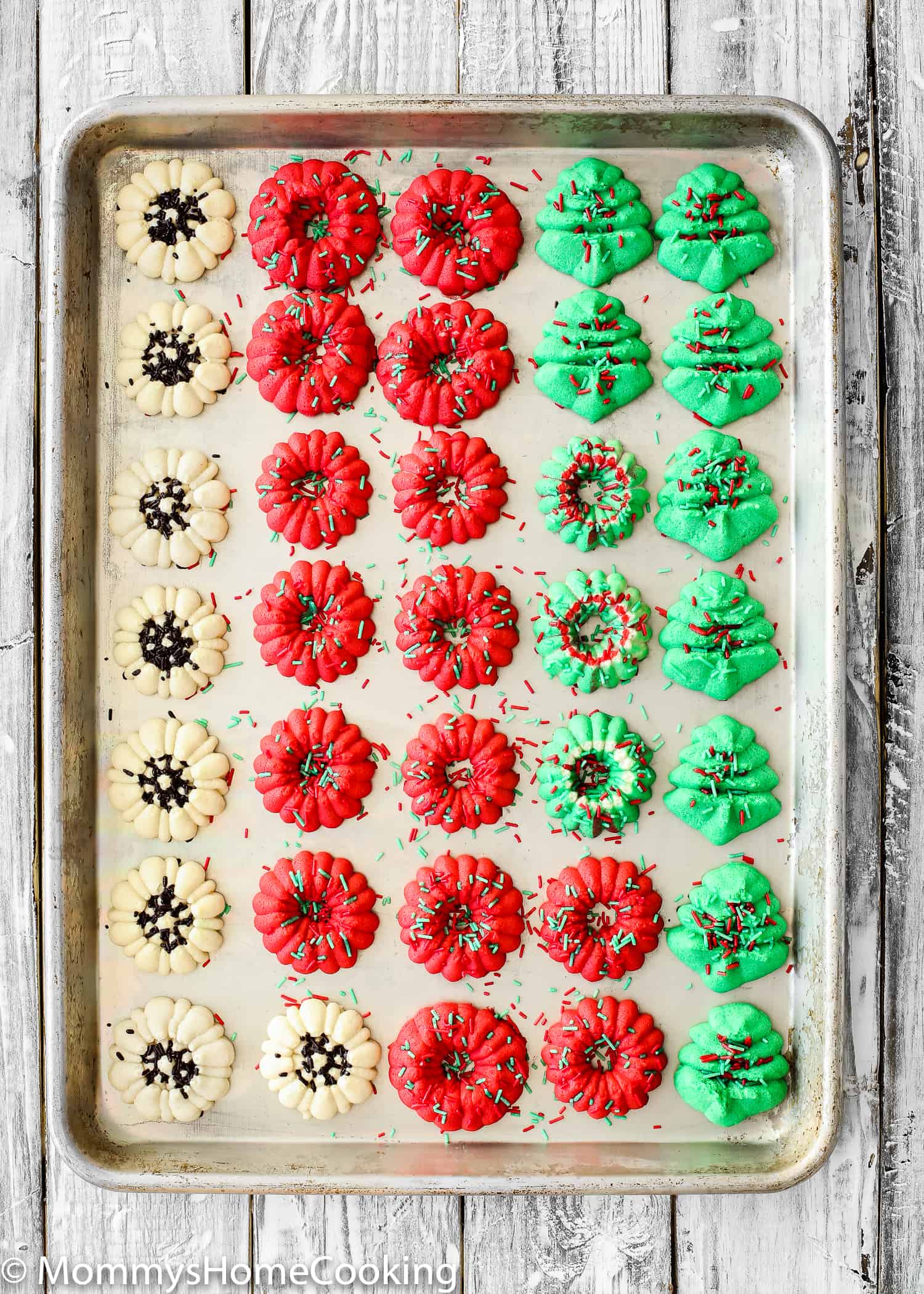 baked Eggless Spritz Cookies on a baking sheet. 