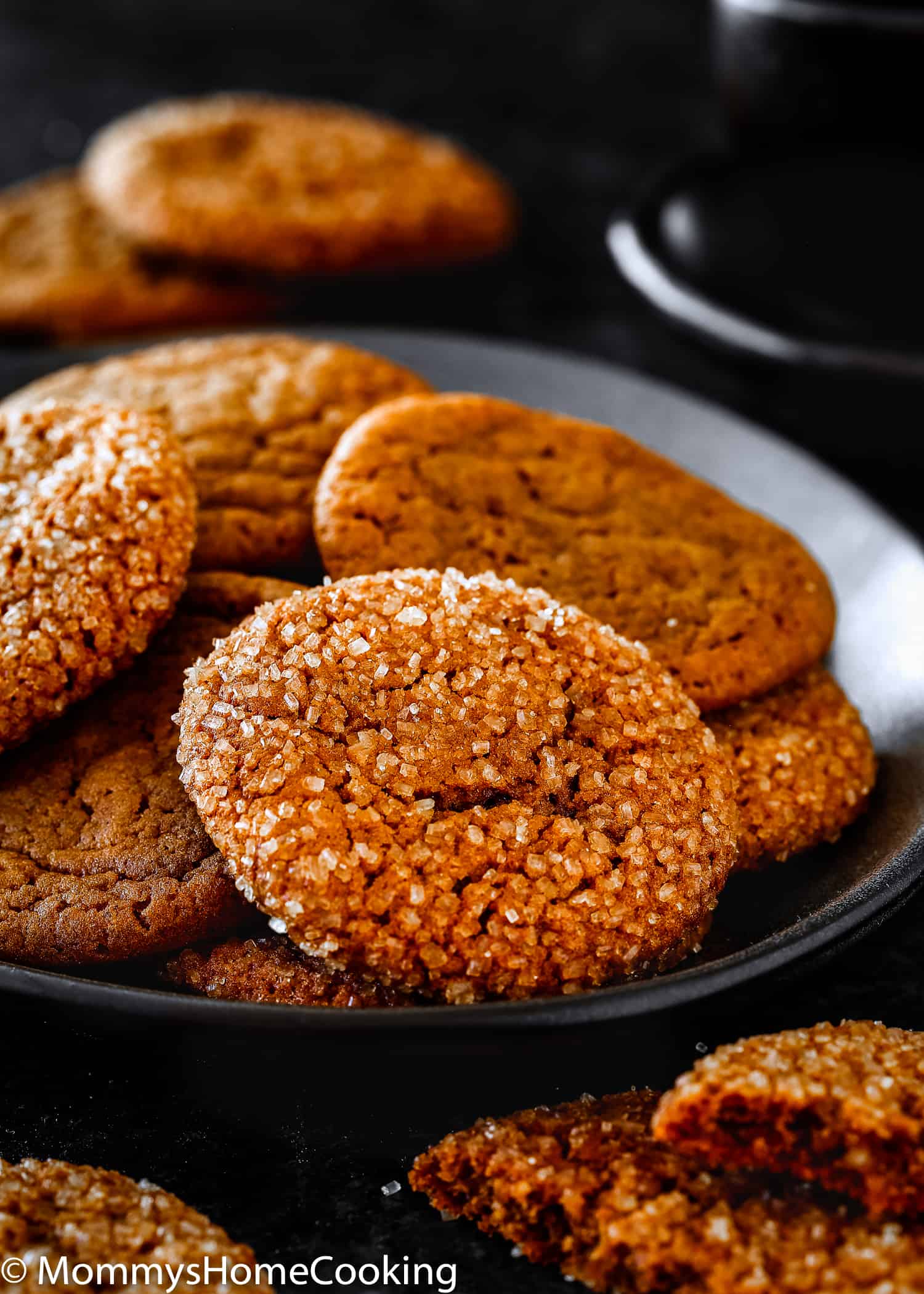 closeup view of Eggless Soft Molasses Cookies on a plate.