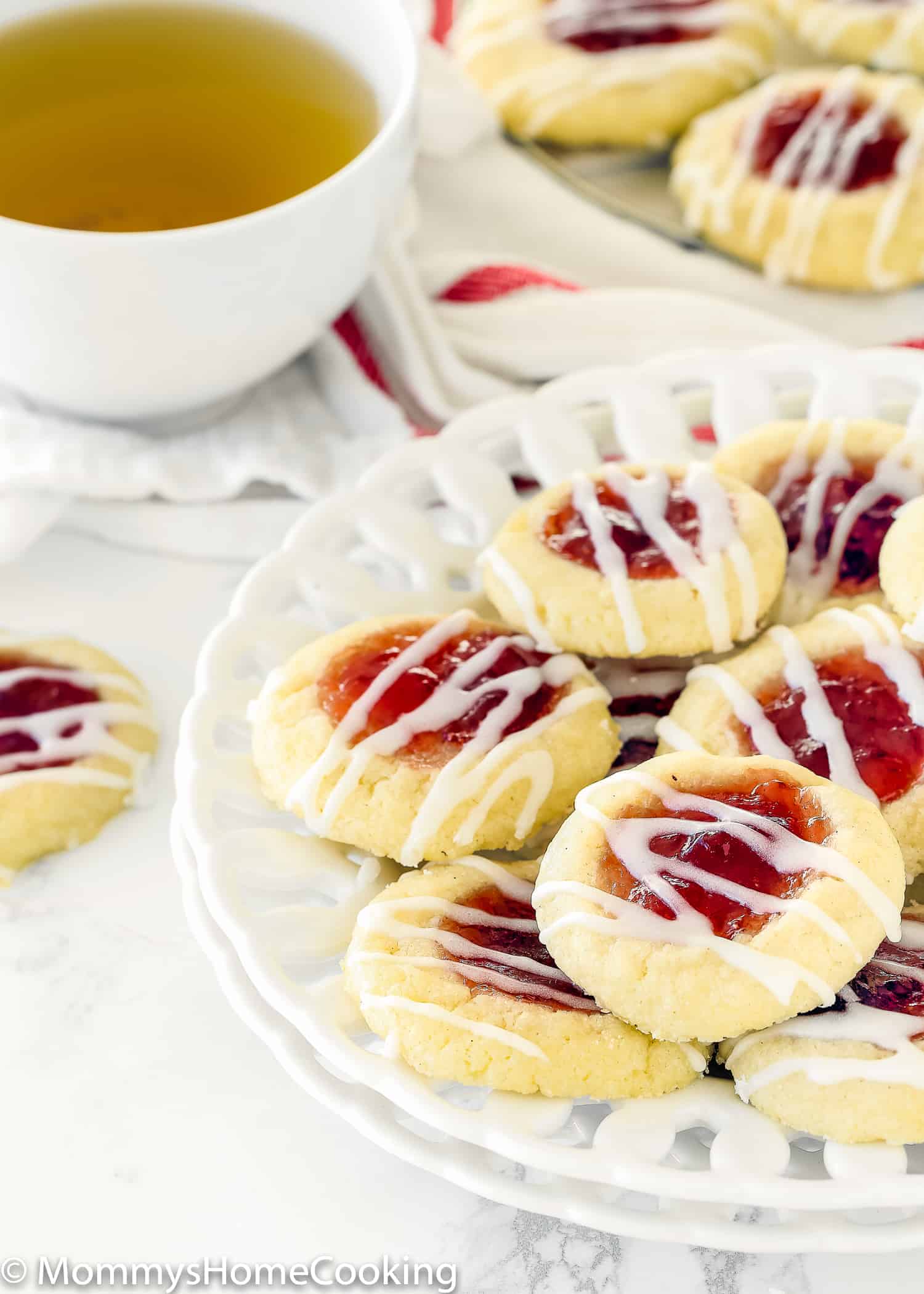 Eggless Thumbprint Cookies on a white plate.