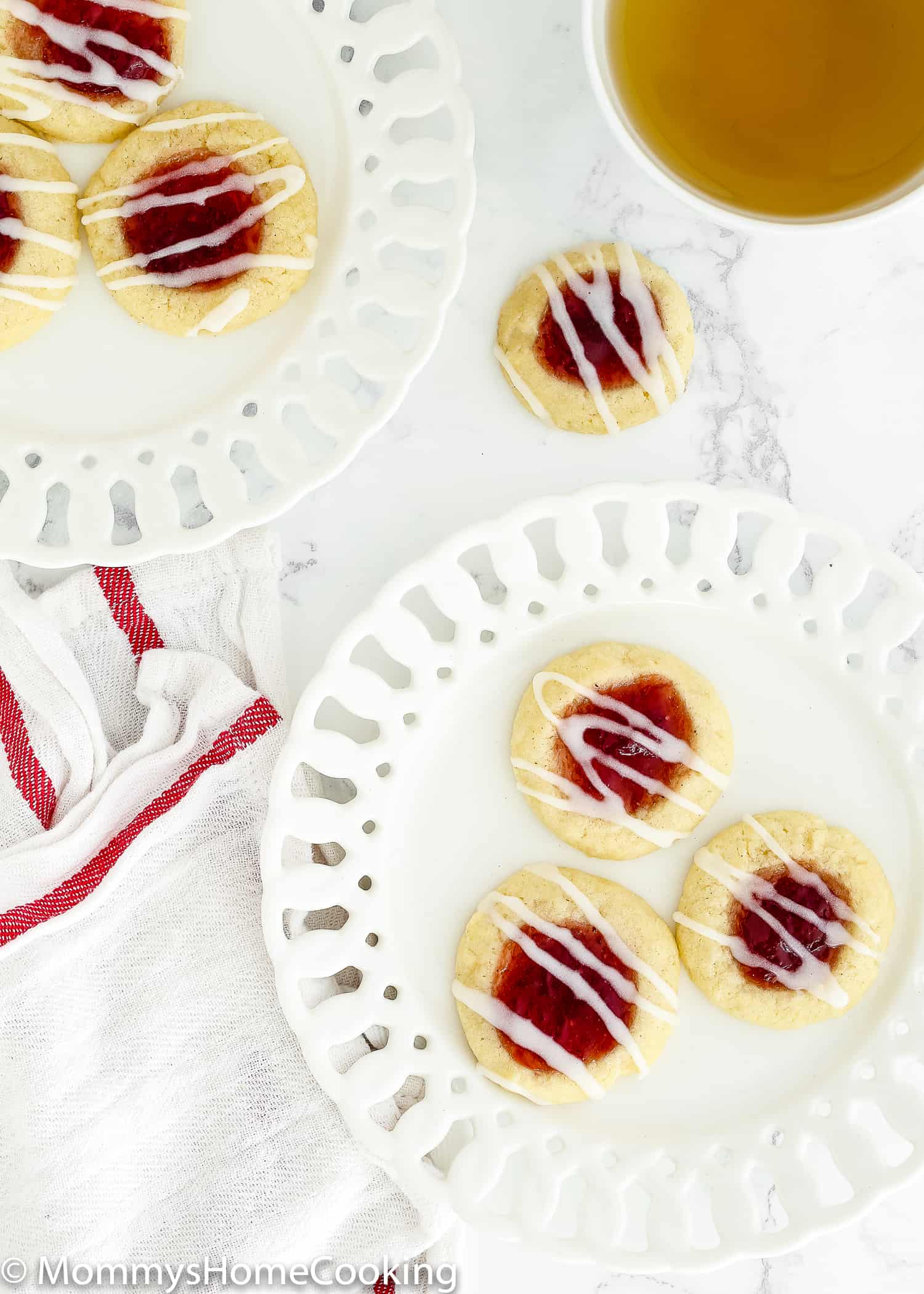 overhead view of a plate with Eggless Thumbprint Cookies.