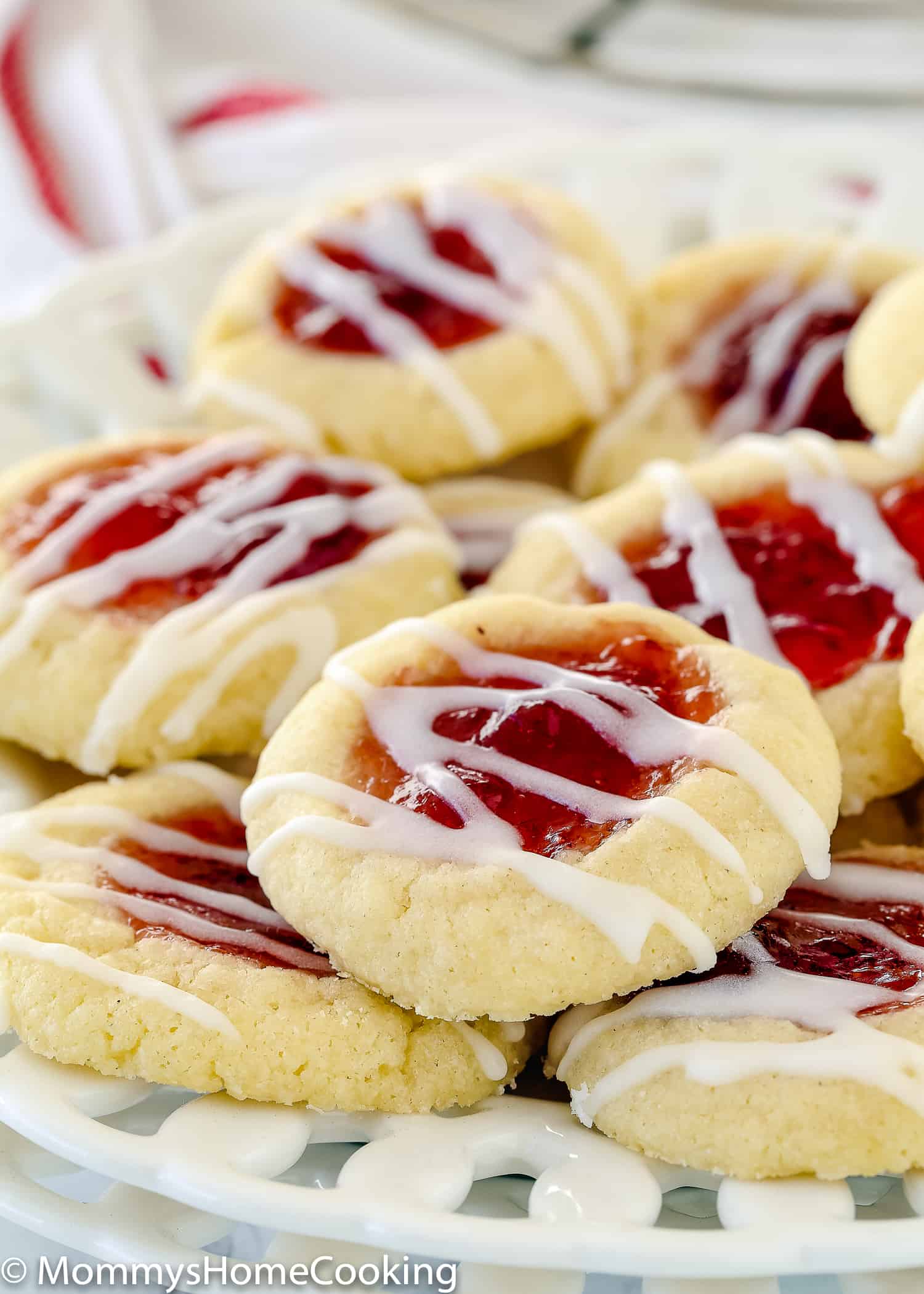 Eggless Thumbprint Cookies with sugar glaze on a plate