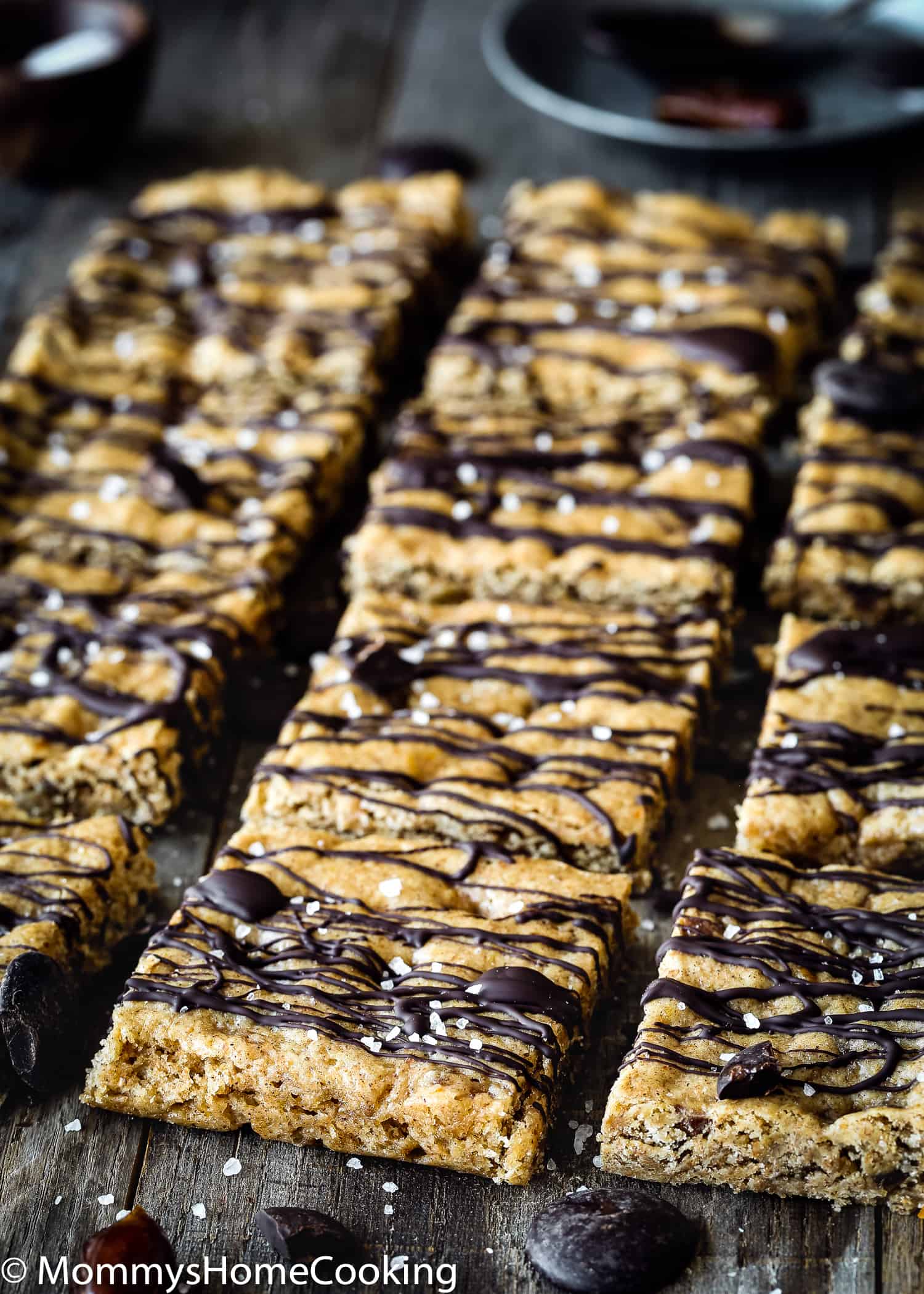 Homemade Healthy Eggless Energy Bars drizzled with chocolate.