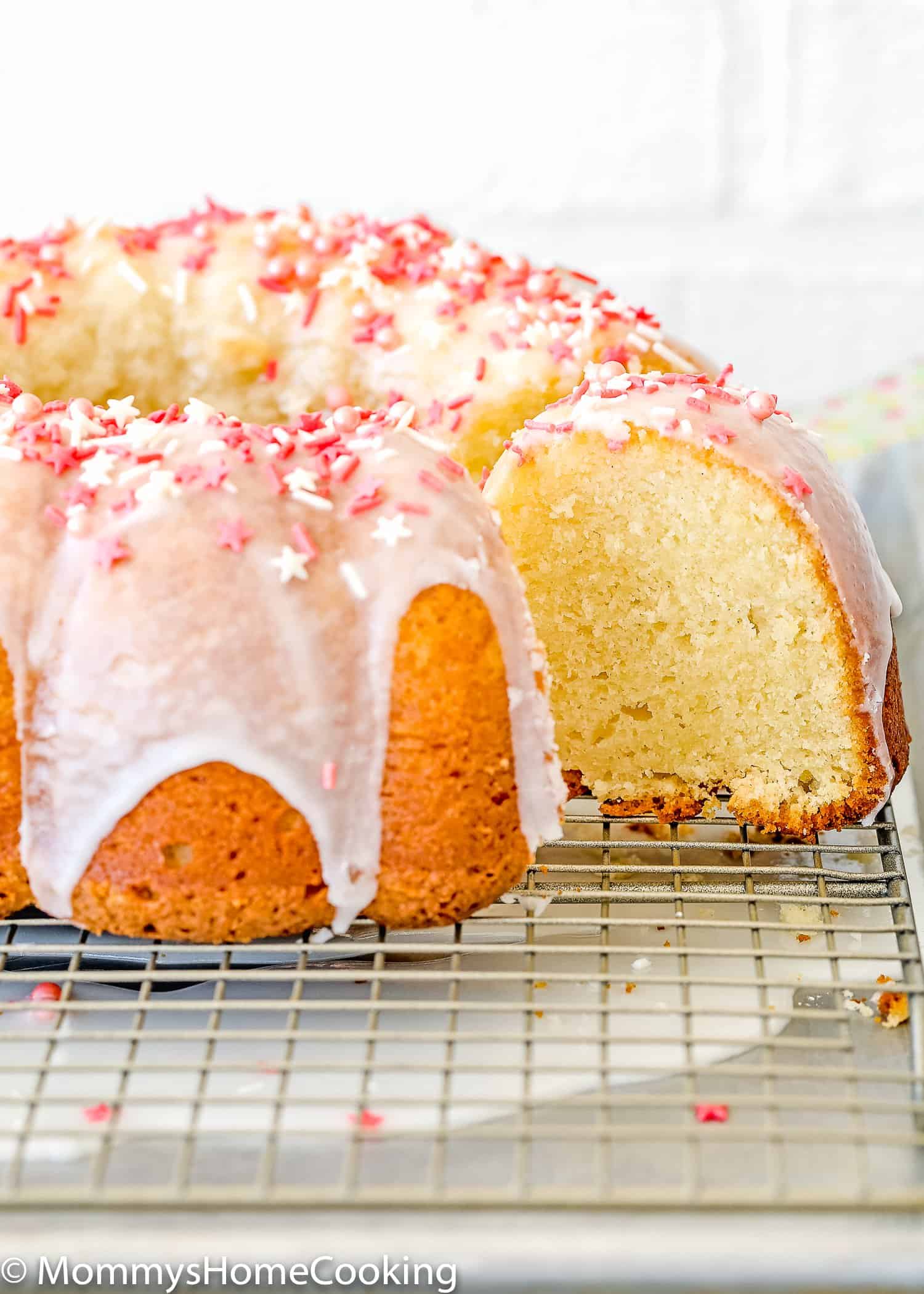  Easy Eggless Vanilla Pound Cake over a cooling rack.