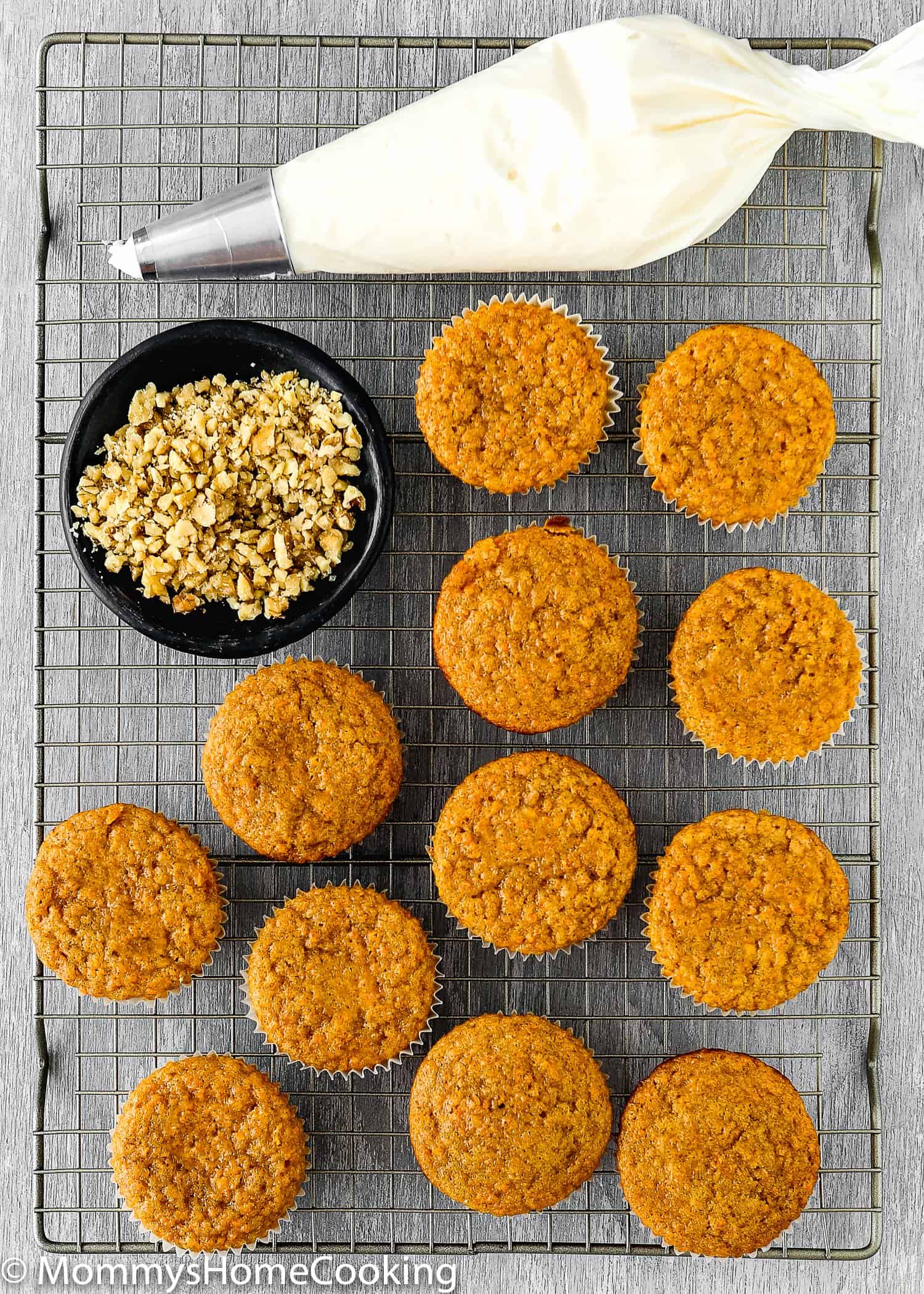 Eggless Carrot Cake Cupcakes over a cooling rack 